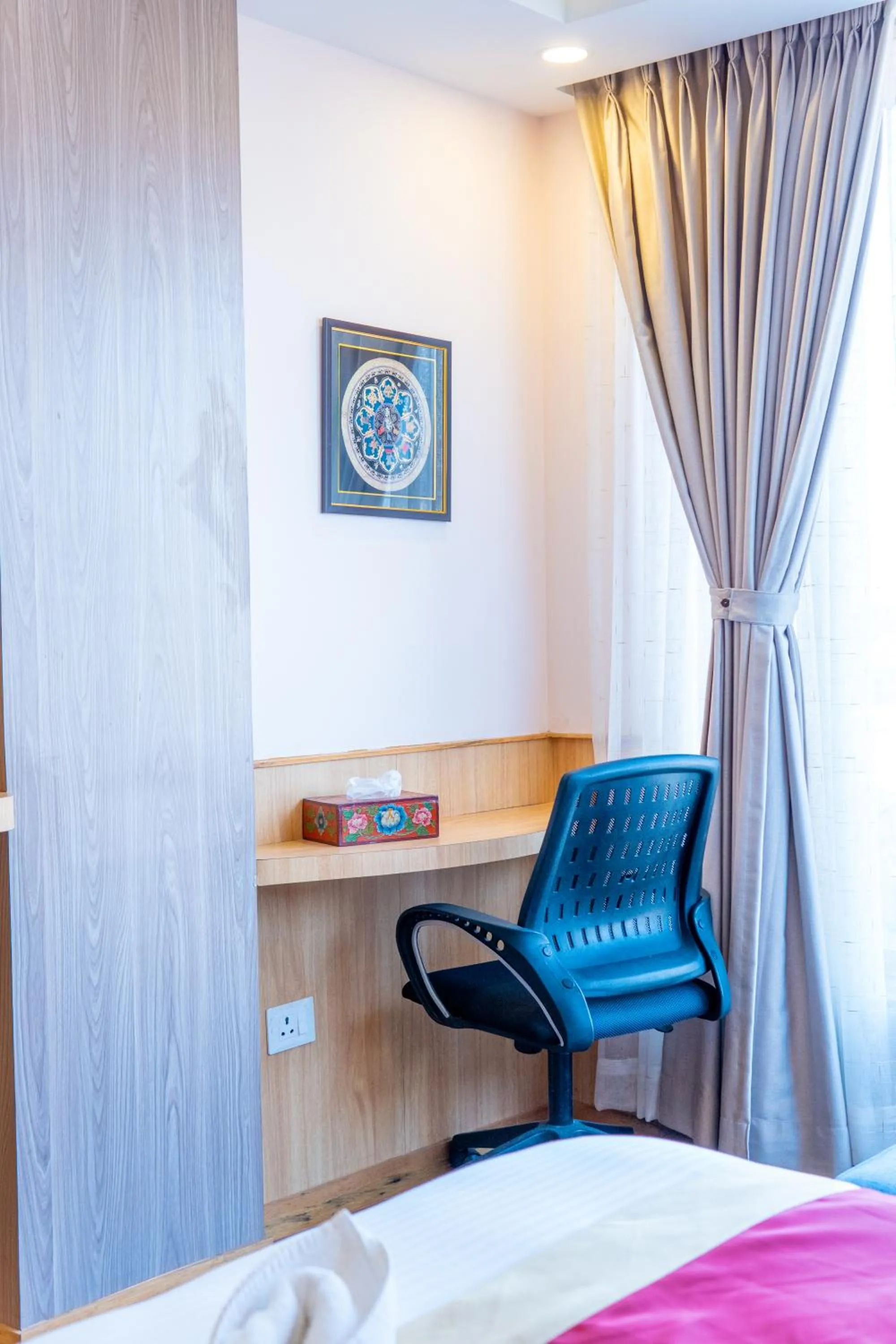 Seating area, Bed in Hotel Yakroo Manang