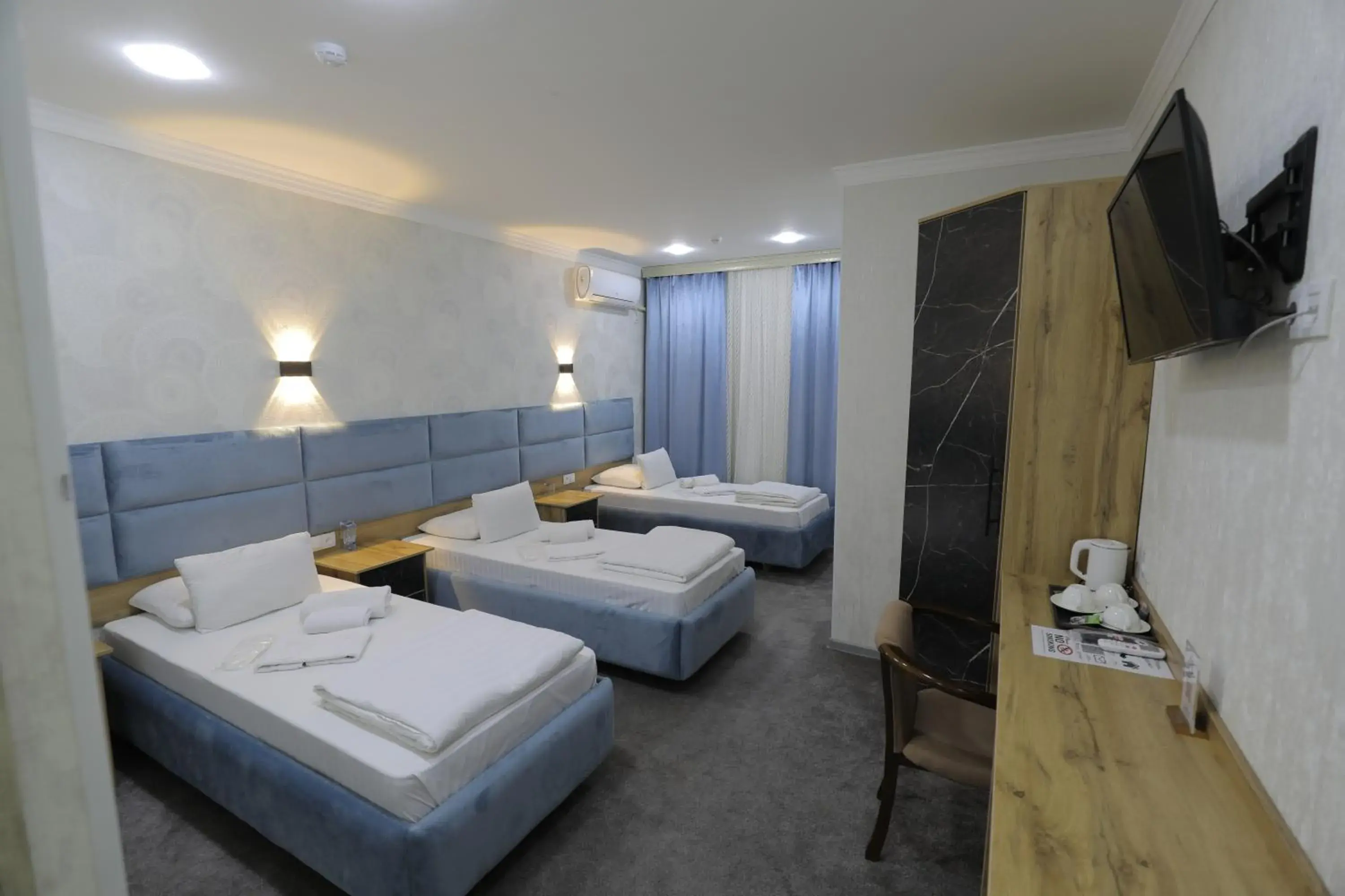 Budget Triple Room - single occupancy in Sharq hotel Budget Triple Room - single occupancy in Sharq hotel