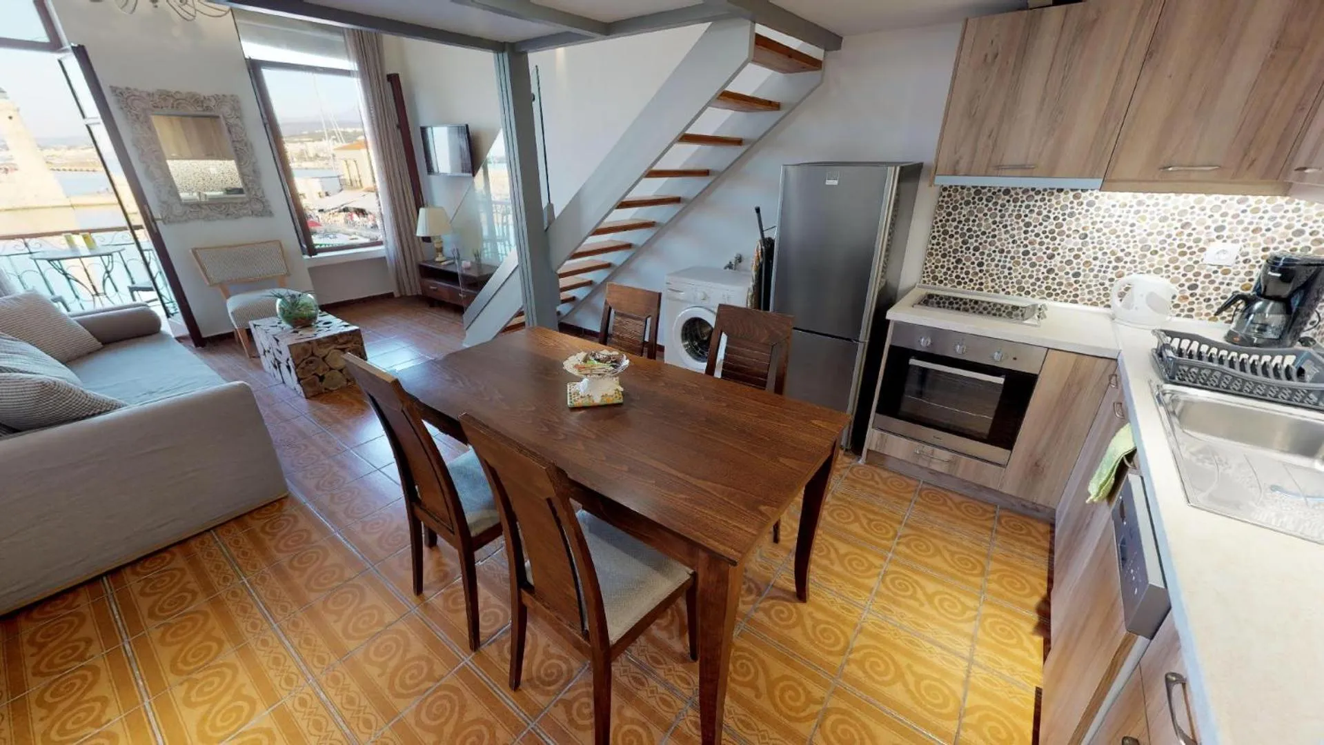 Kitchen or kitchenette in Porto Enetiko Suites