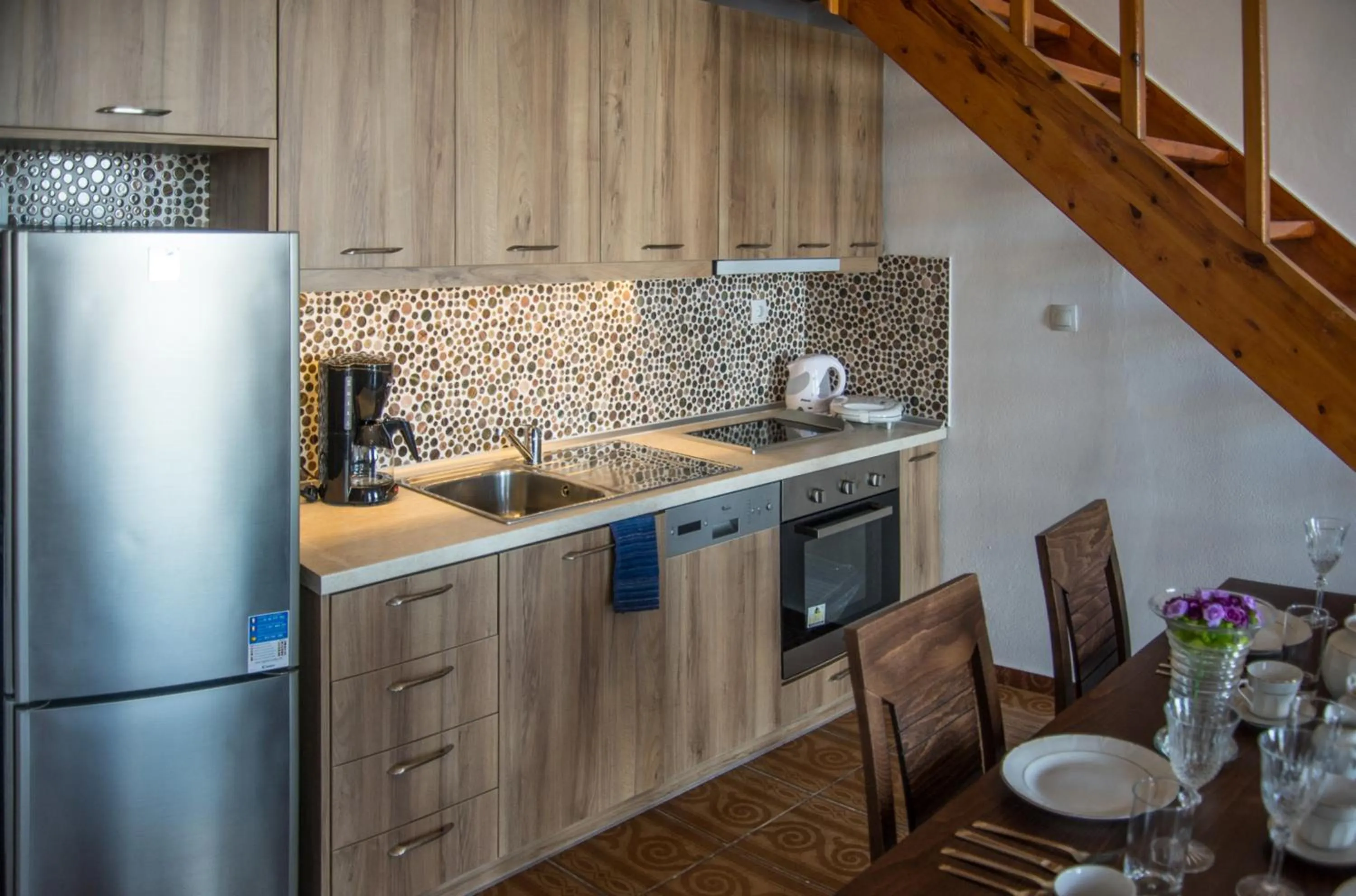 Kitchen or kitchenette in Porto Enetiko Suites