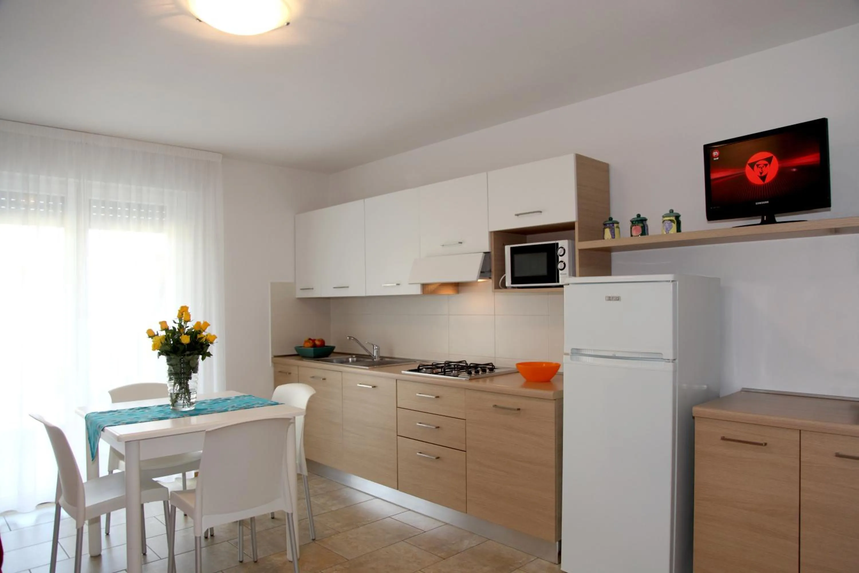 Kitchen or kitchenette in Villa Bruna