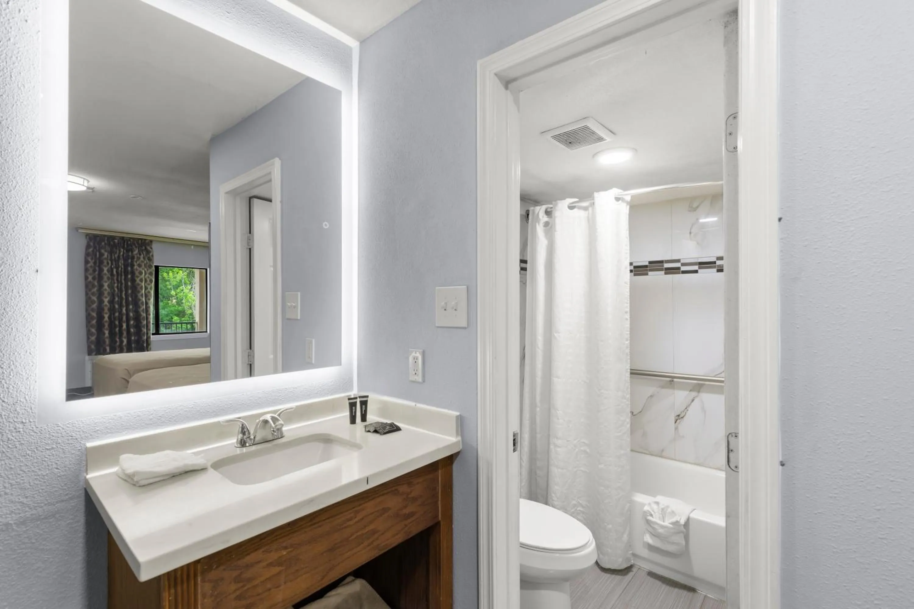 Bathroom in Travel Inn & Suites