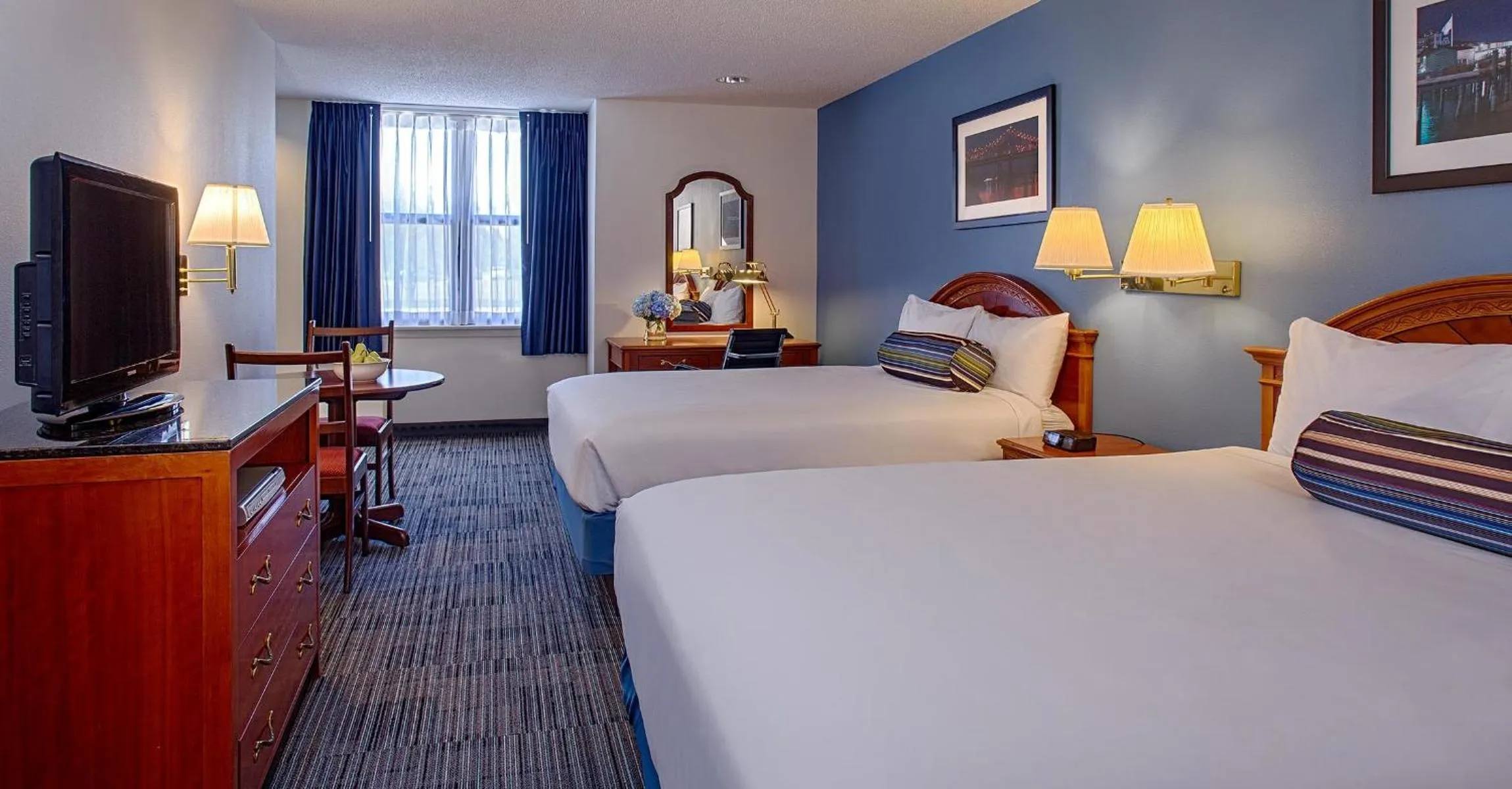 Bed in Federal City Inn & Suites