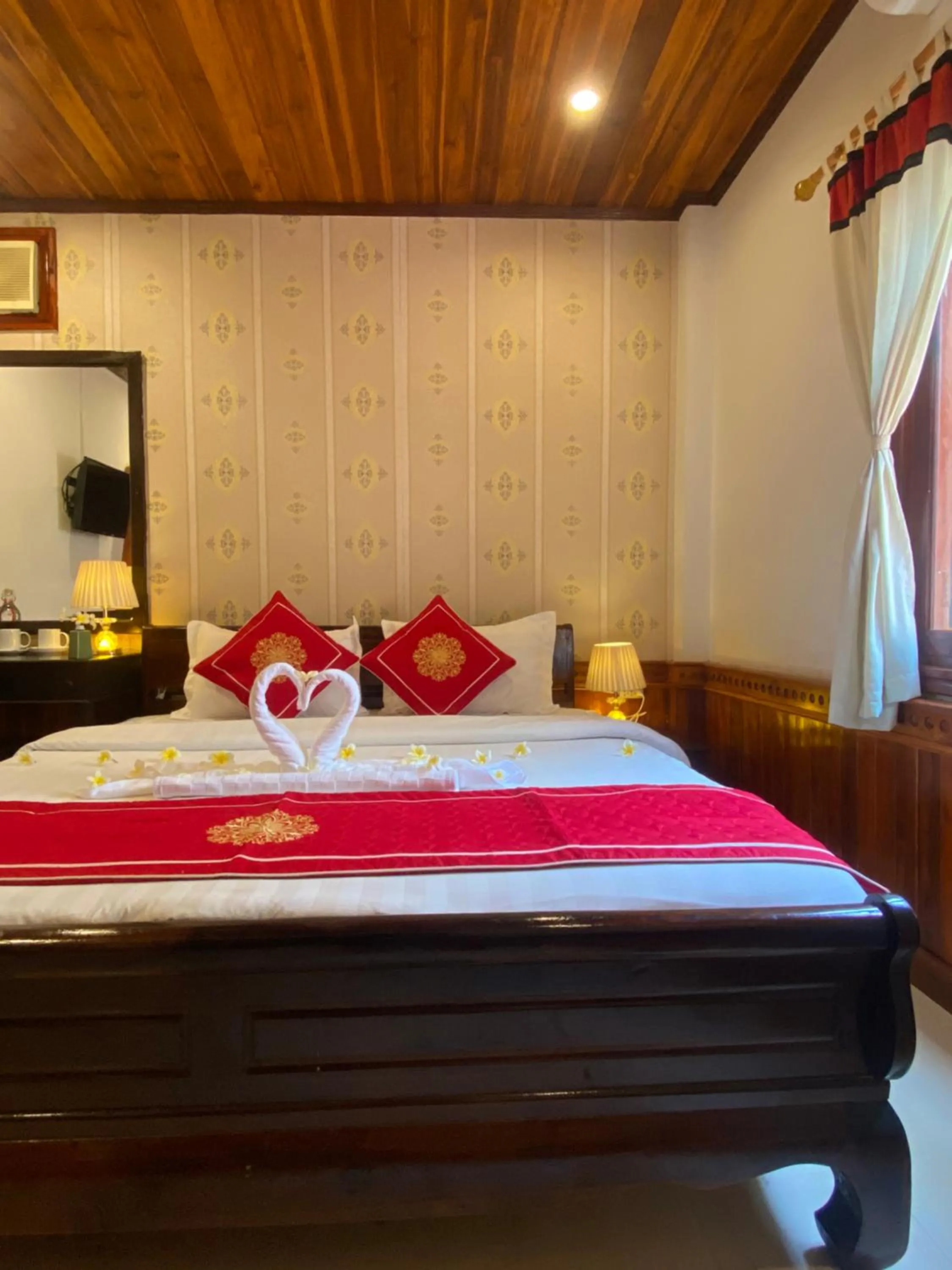 Bed in Golden Lotus Boutique Hotel