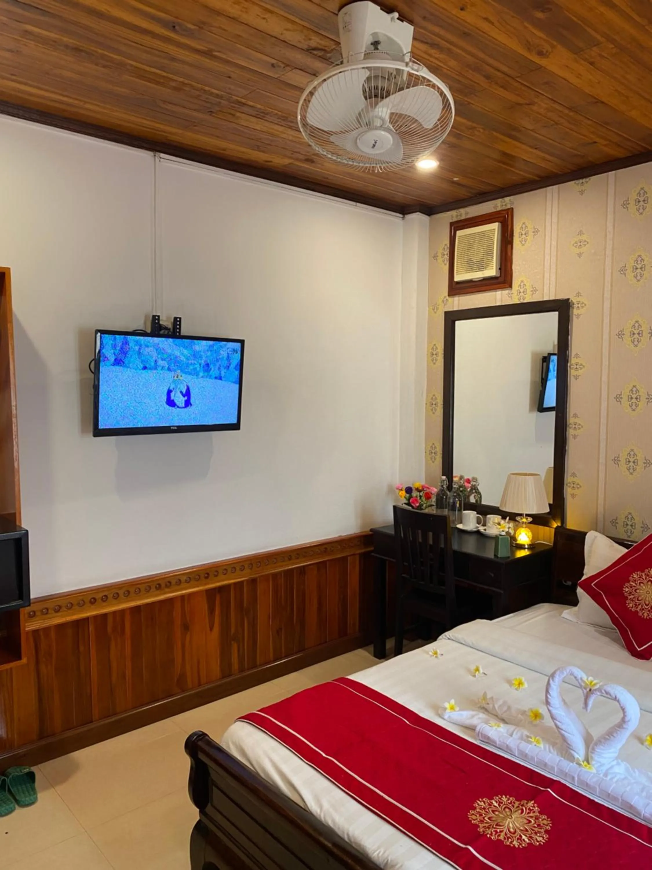 Bed in Golden Lotus Boutique Hotel