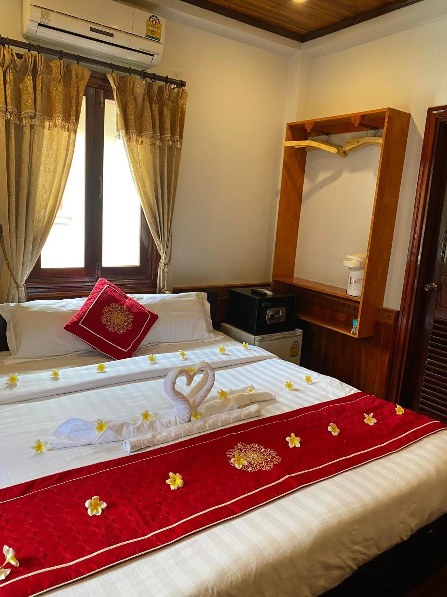 Bed in Golden Lotus Boutique Hotel