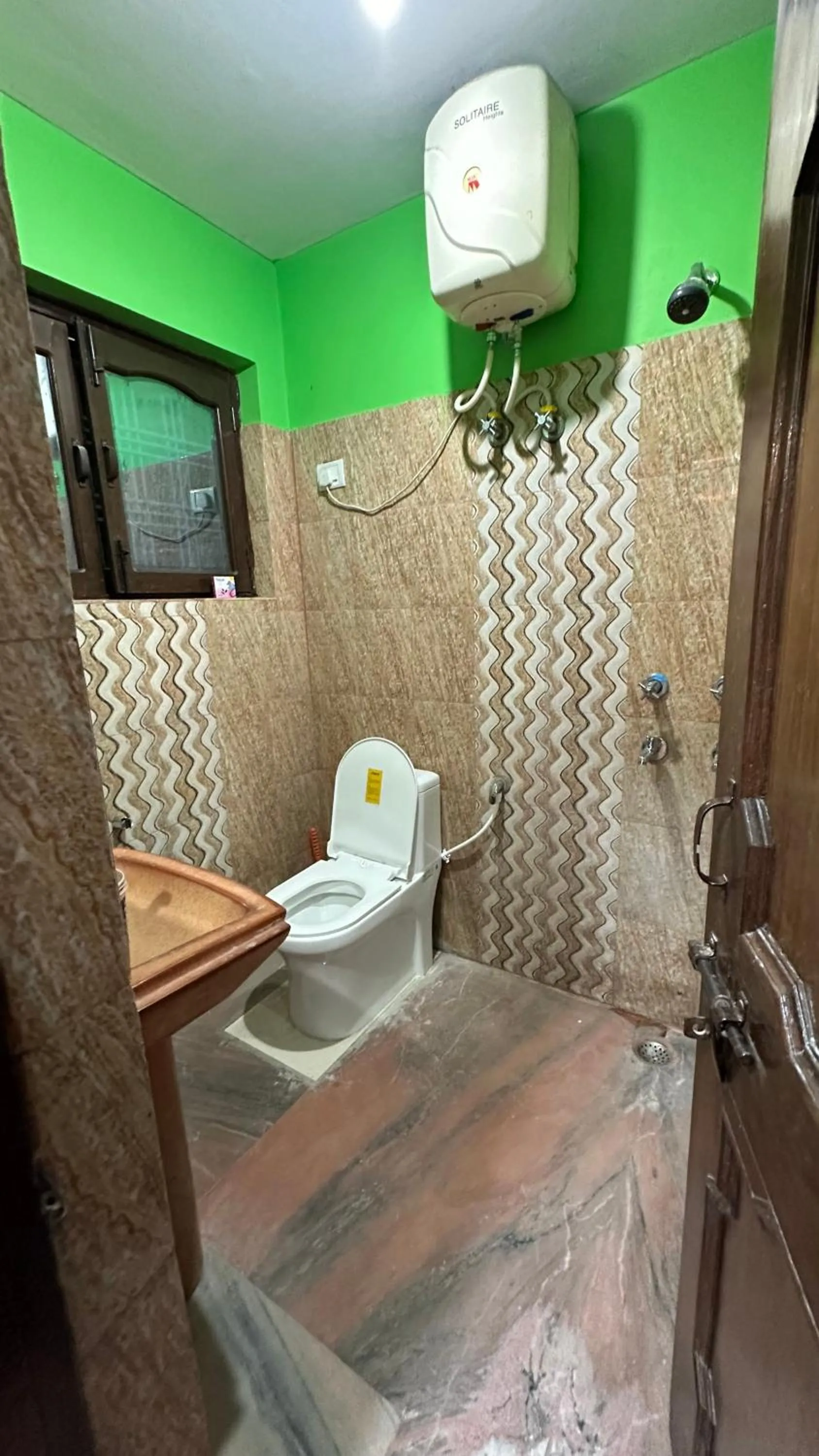 Shower in Hotel Maheshwari & Banquet Hall