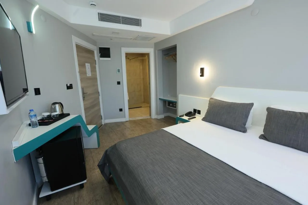 Photo of the whole room, Bed in Midis Otel