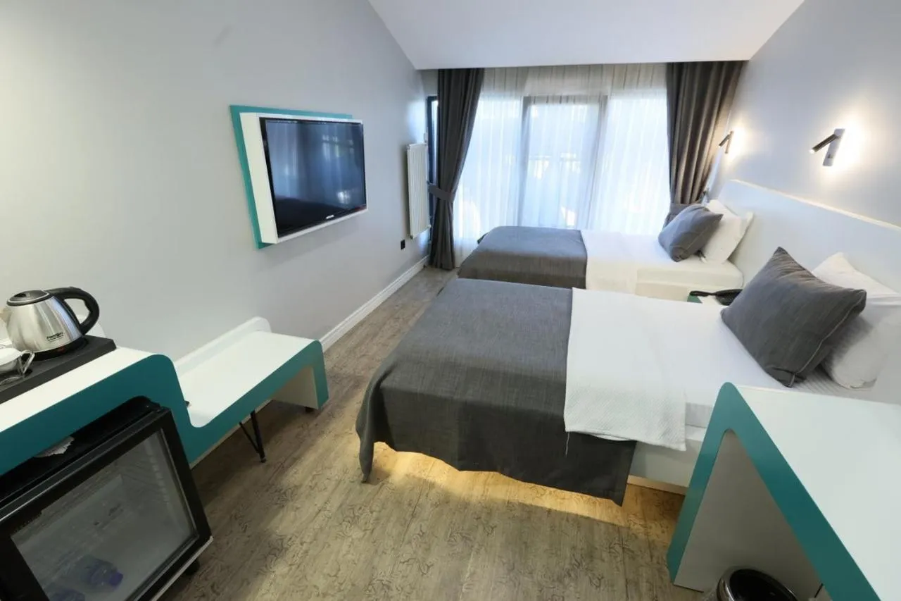 Bed in Midis Otel