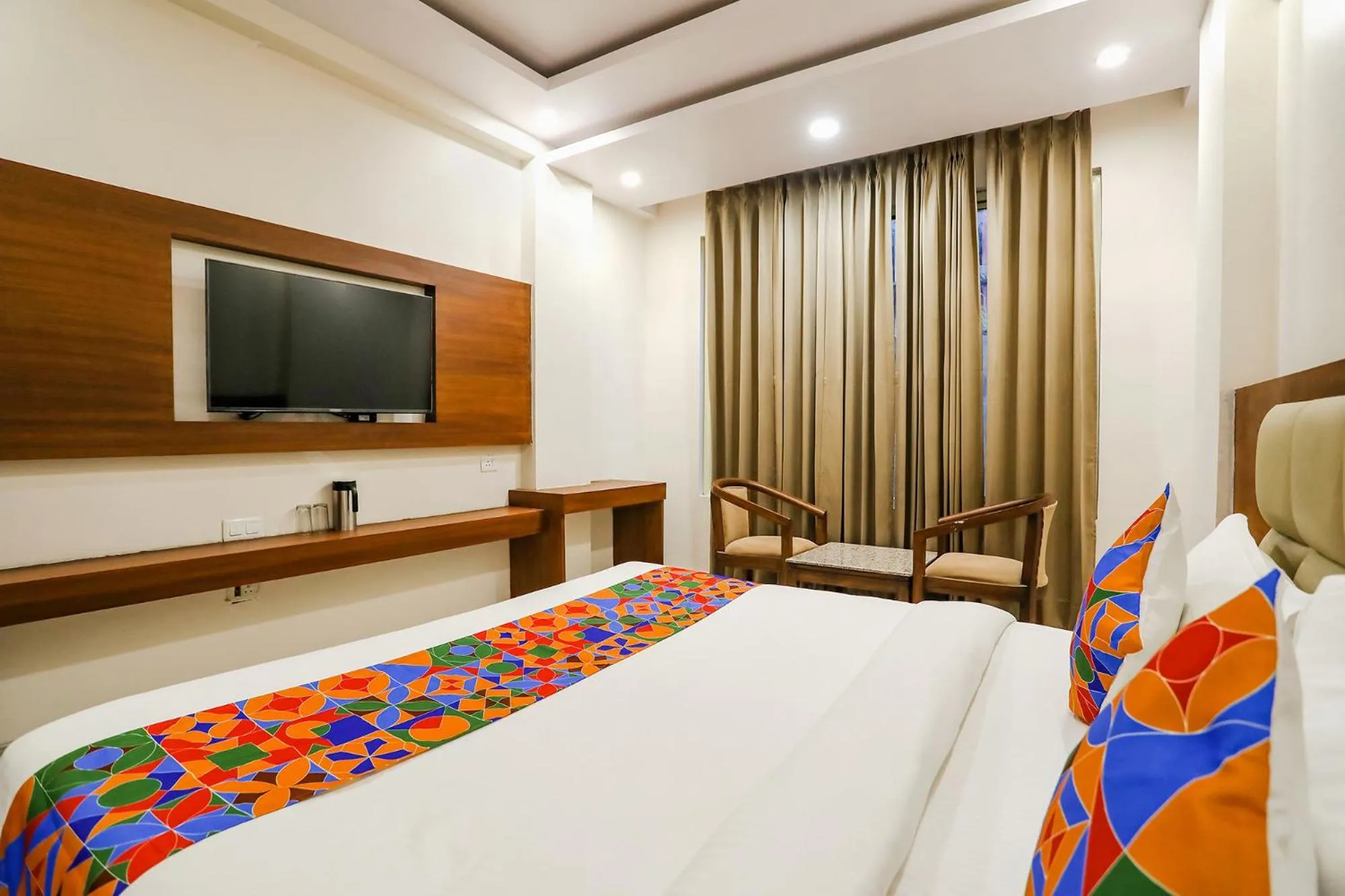 Communal lounge/ TV room, Bed in FabHotel Aman Sara