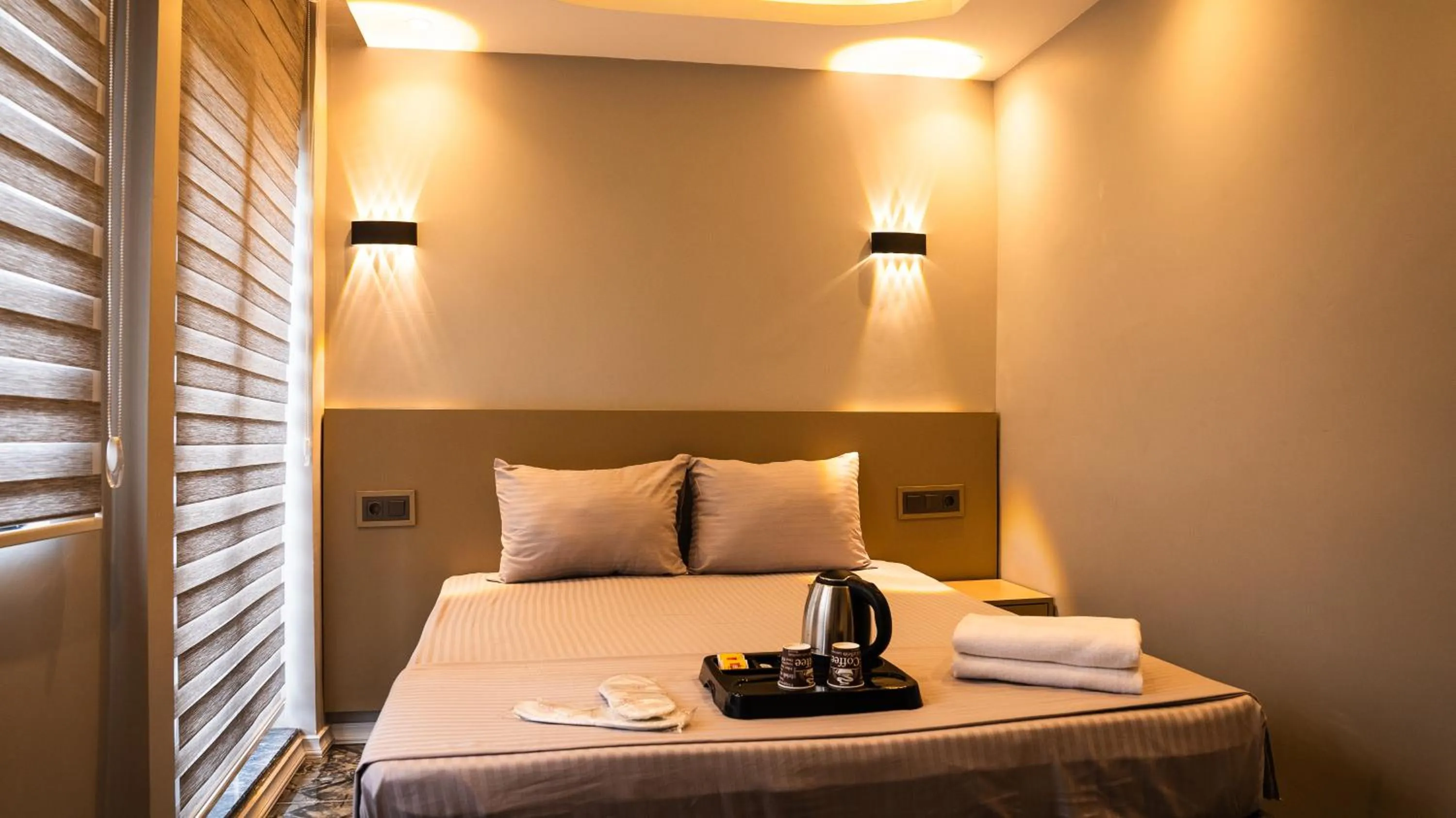 Bed in CK PALACE Hotel