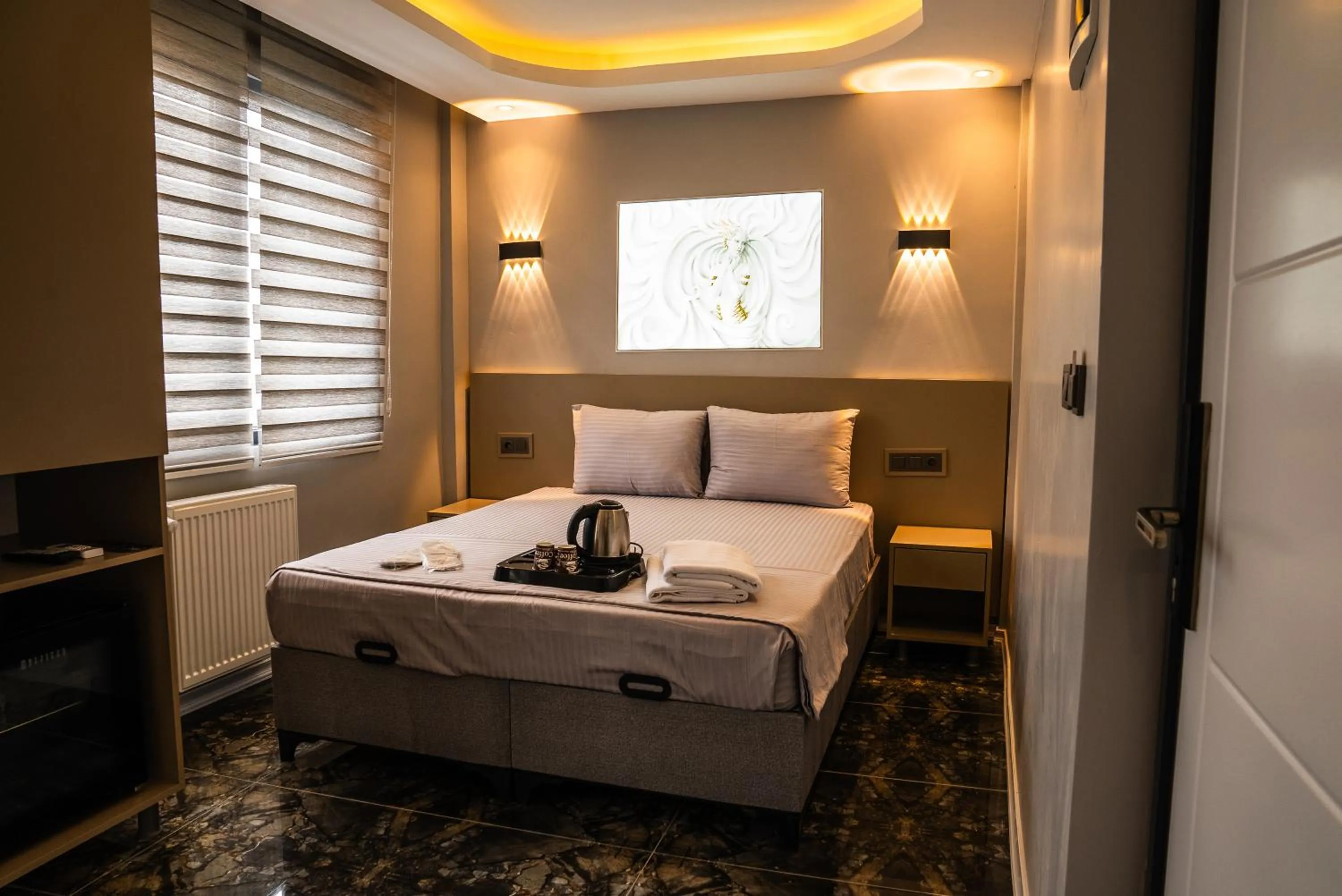 Bed in CK PALACE Hotel