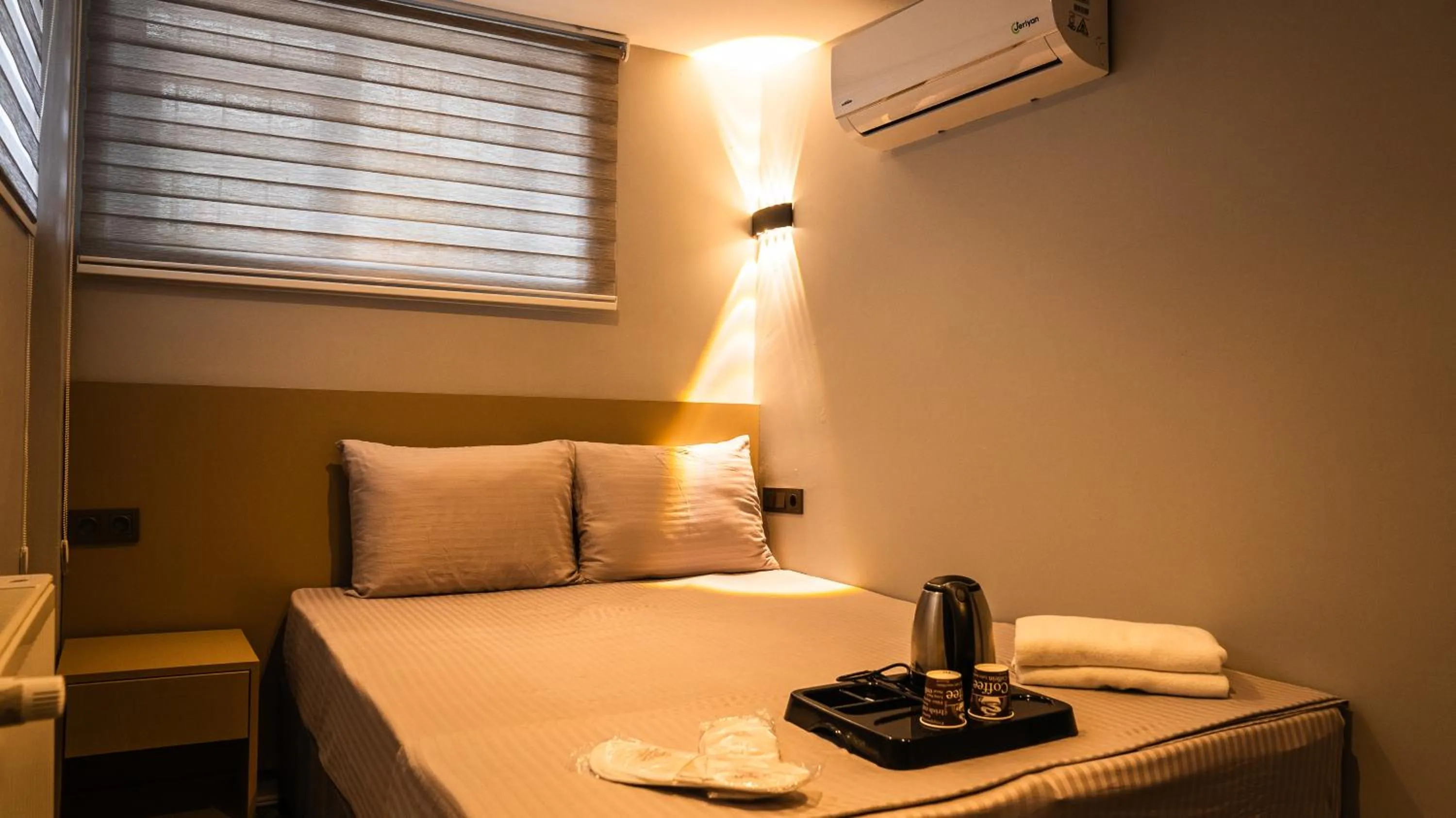 Bed in CK PALACE Hotel