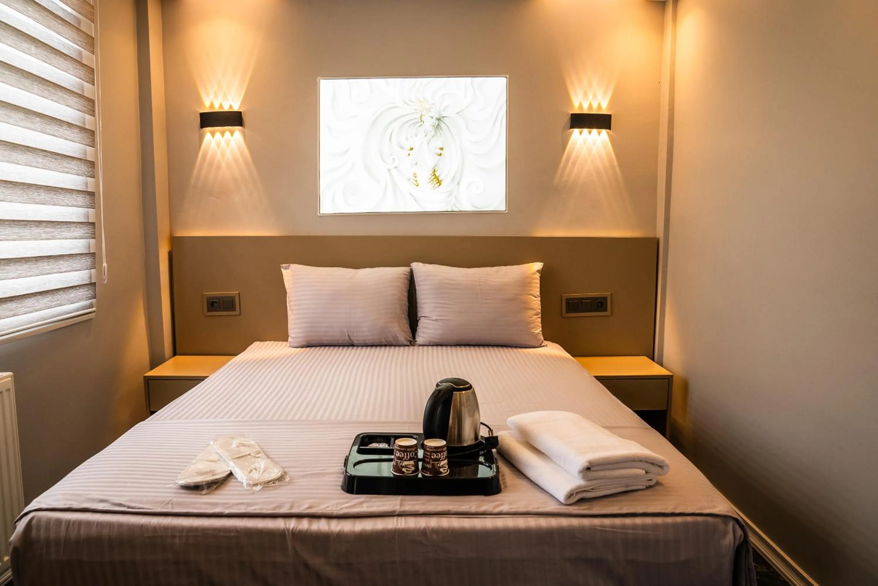 Bed in CK PALACE Hotel