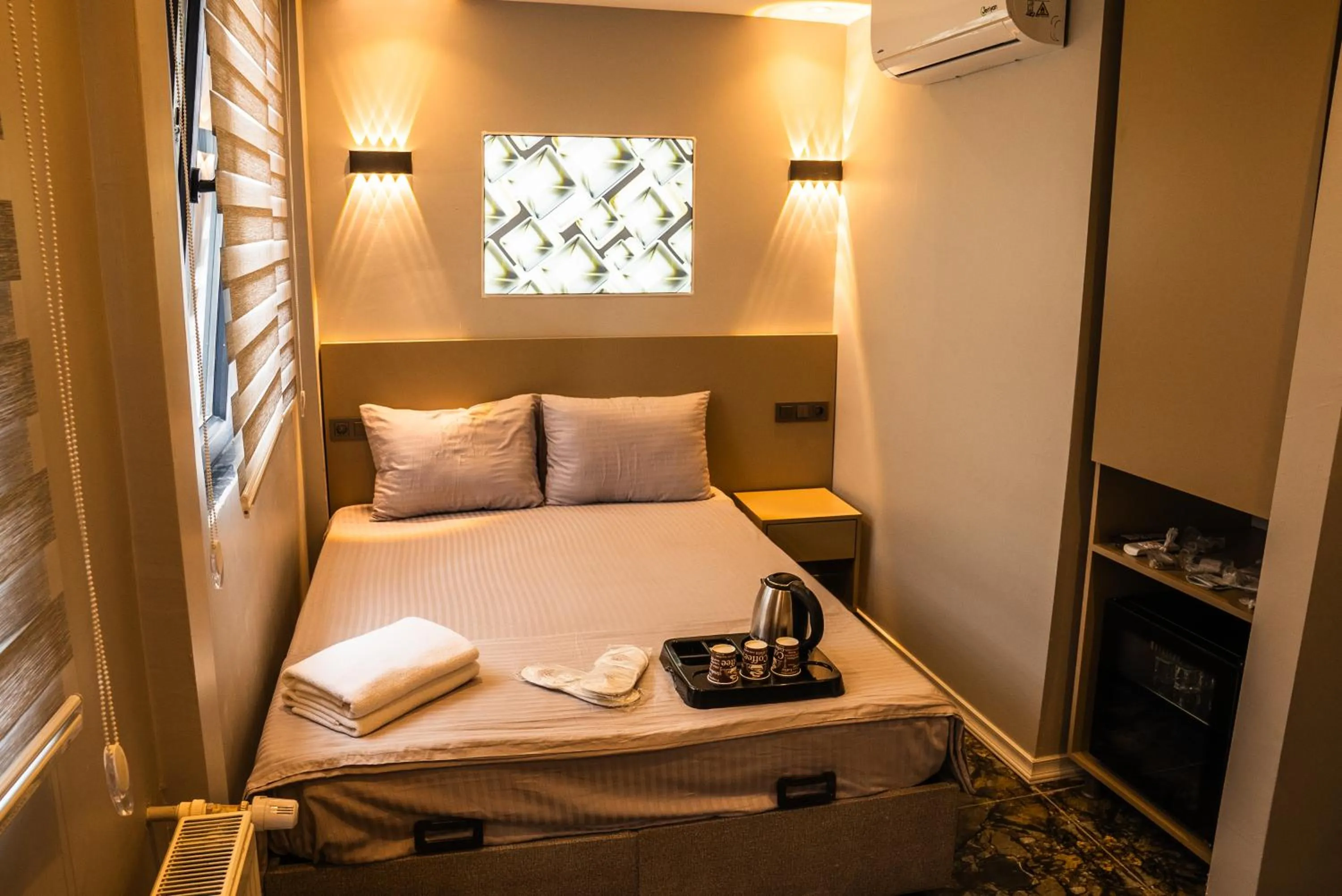 Bed in CK PALACE Hotel