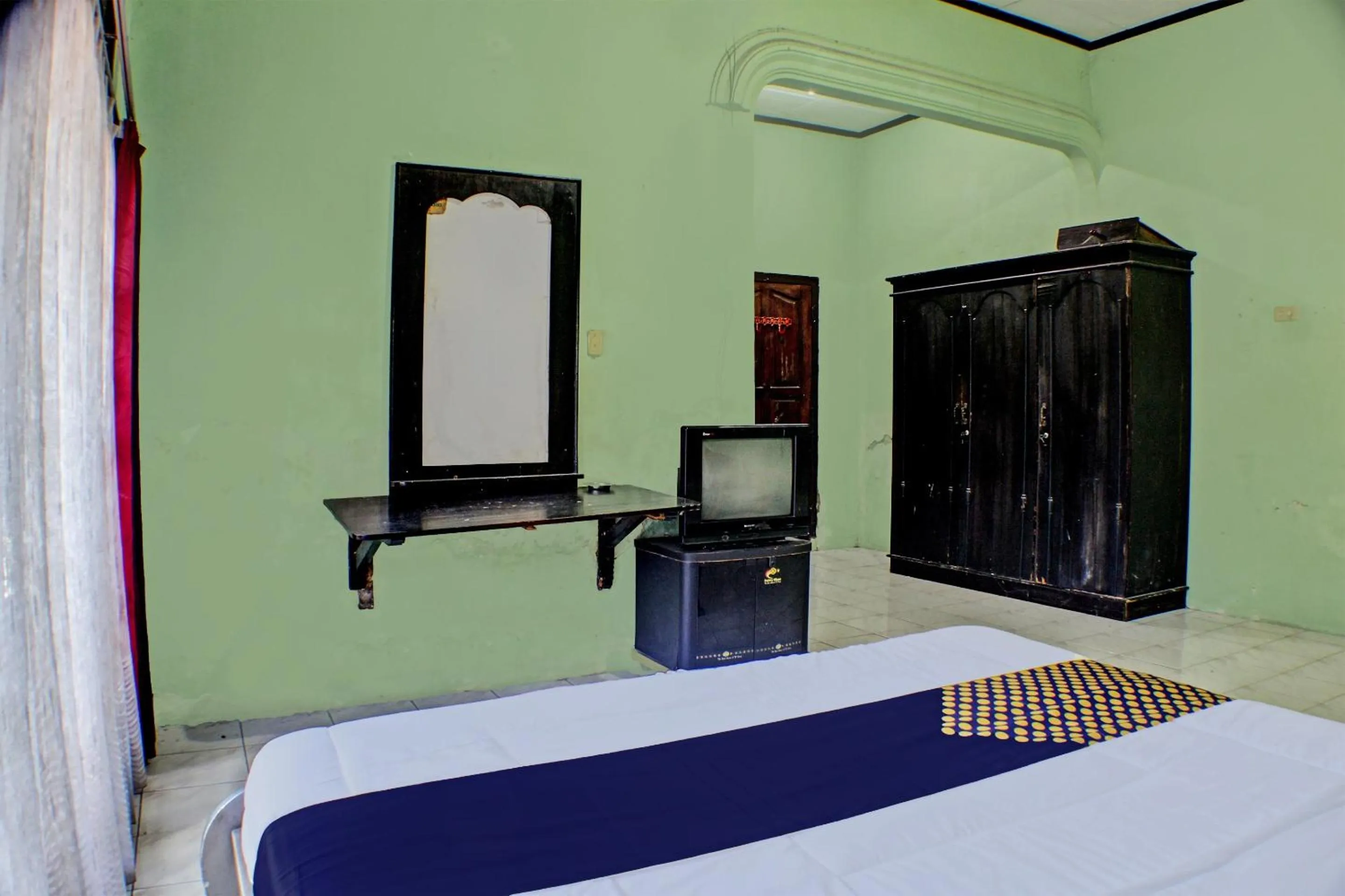 Bedroom, Bed in Hotel O Badar Guest House Syariah