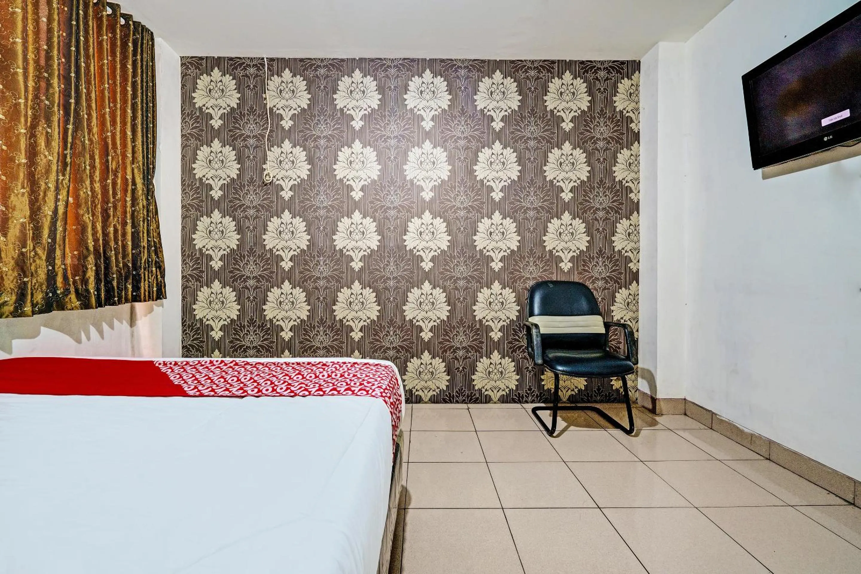 Bedroom in Hotel O Geulis Guest House Syariah