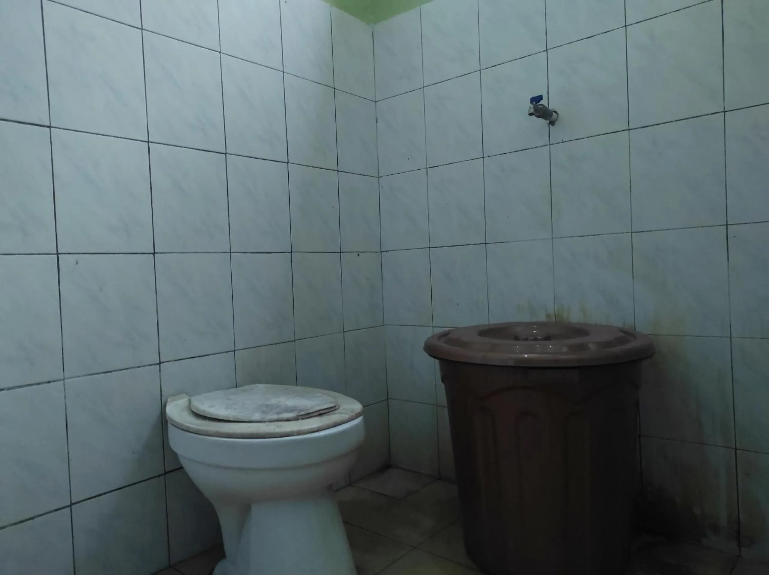 Bathroom in Hotel O Penginapan Syariah Al Syifa