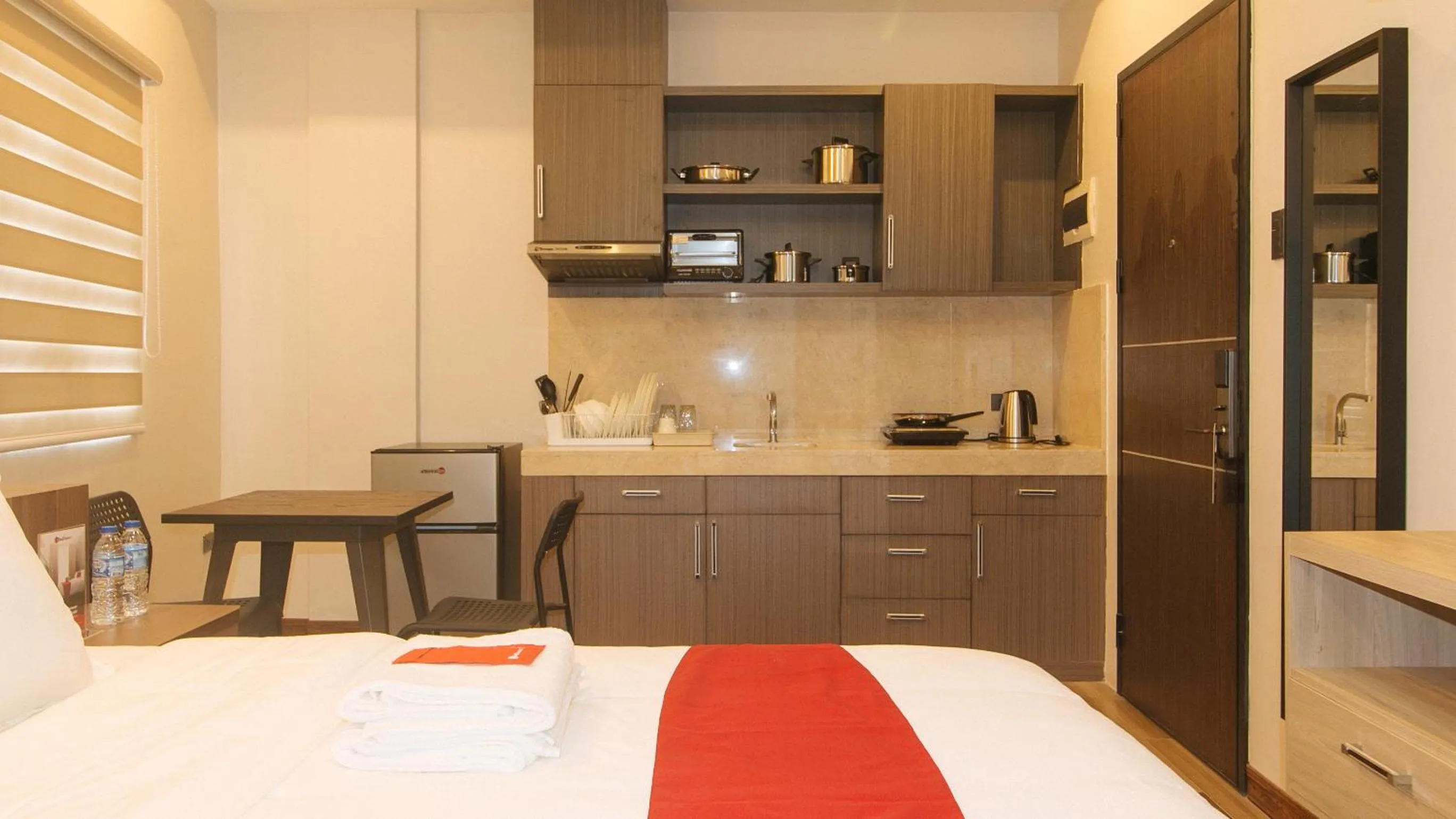 Kitchen or kitchenette, Bed in RedDoorz Plus @ Bez Tower and Residences San Juan