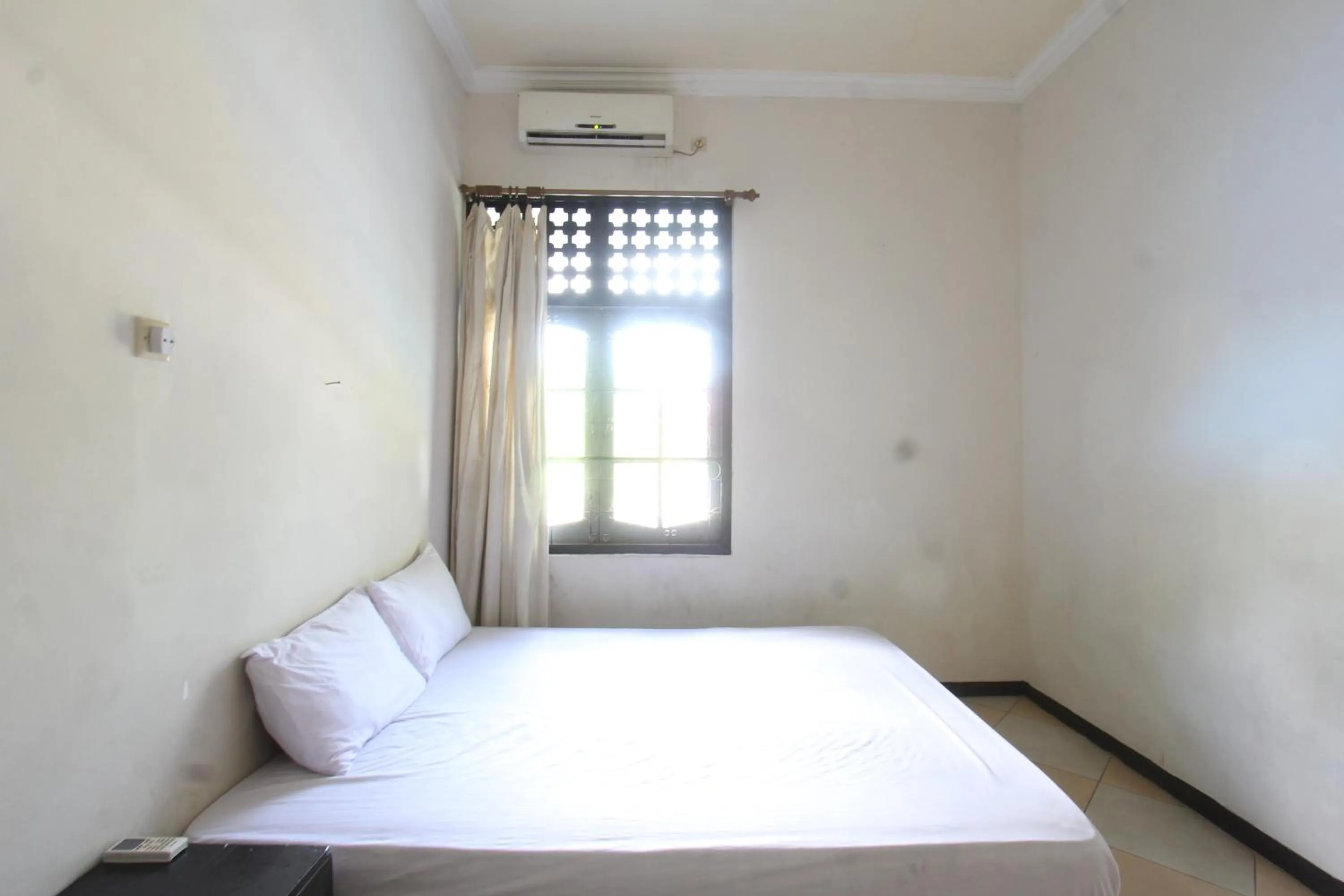 Bedroom, Bed in Hotel O Motel Langko