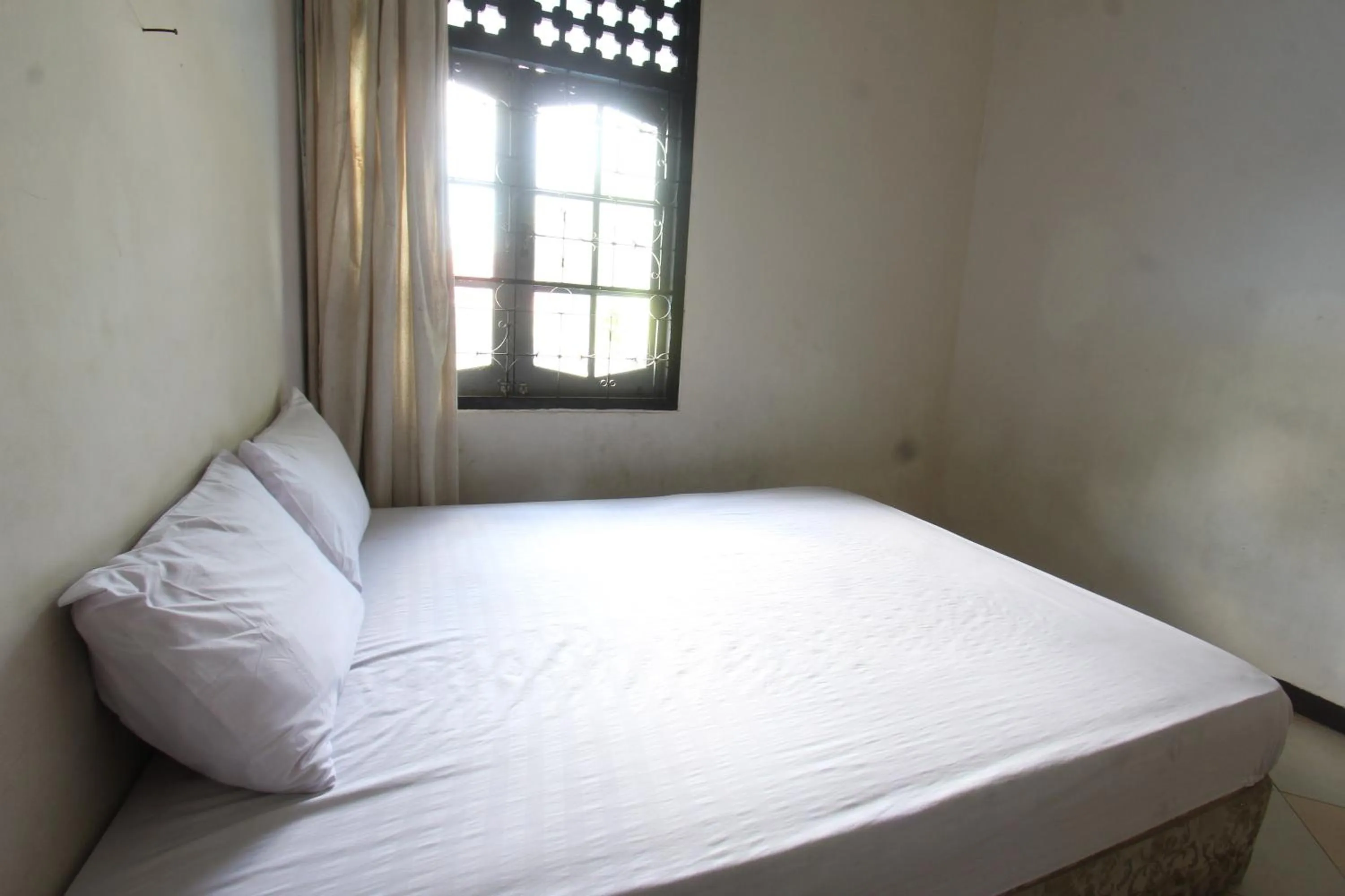 Bedroom, Bed in Hotel O Motel Langko