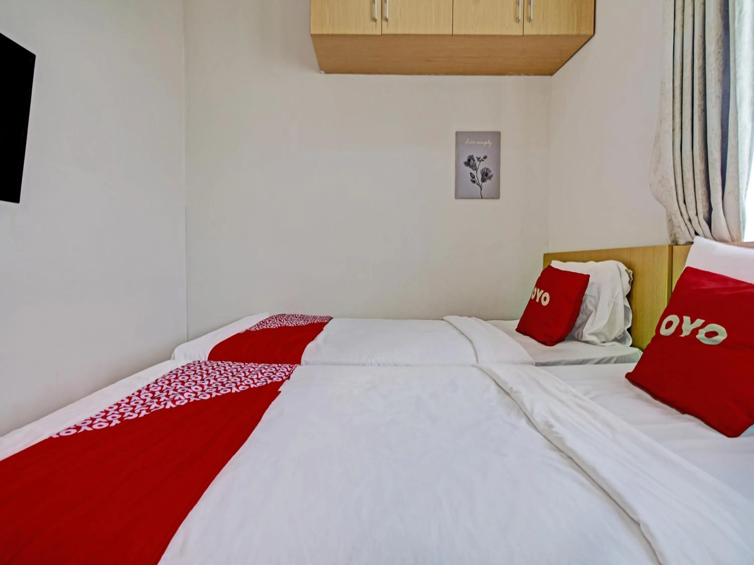 Bedroom in Hotel O Losmen Diah Syariah