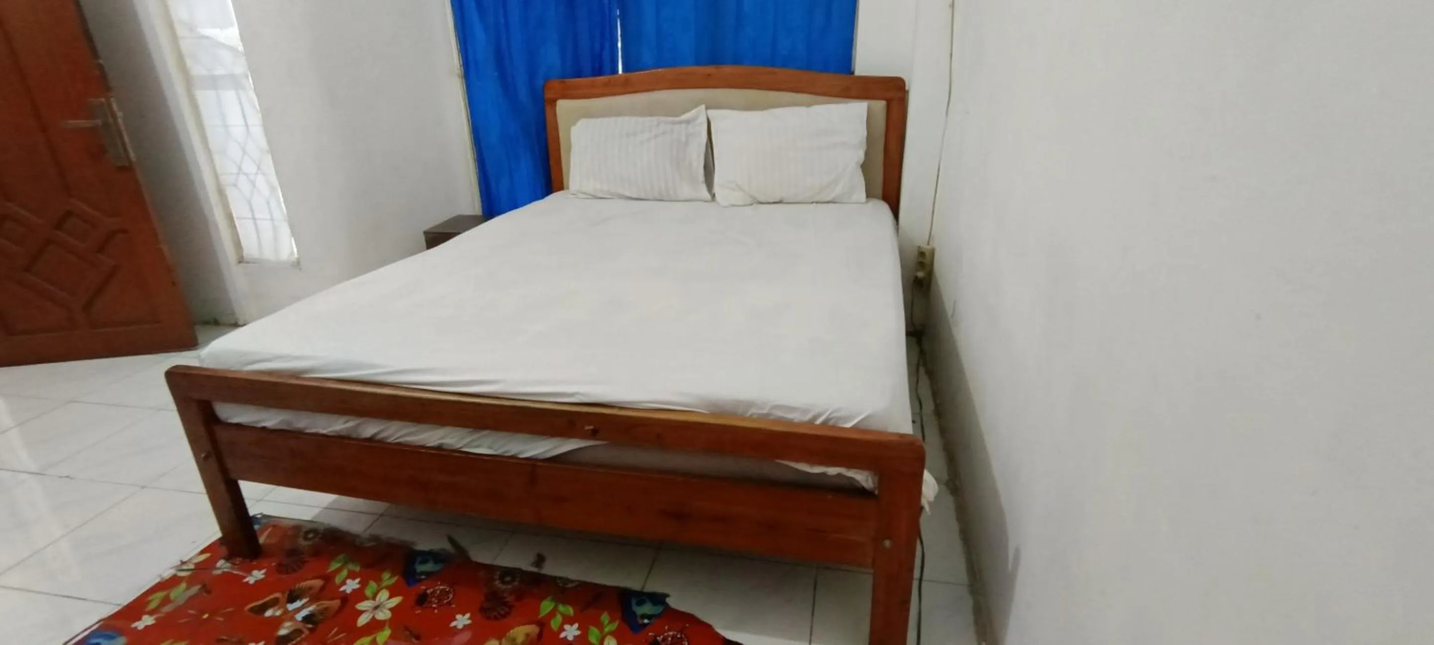 Bedroom, Bed in Hotel O Losmen Griya Mulia Katingan Kuala