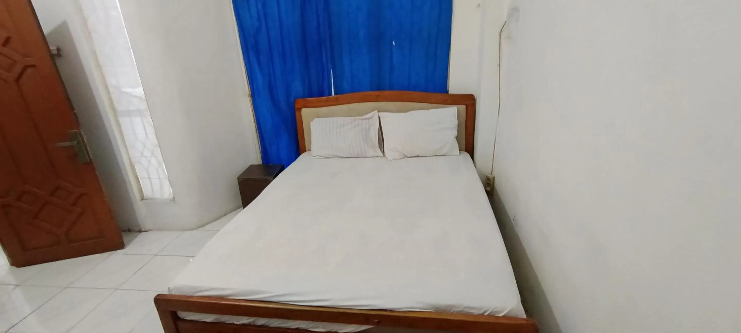 Bedroom, Bed in Hotel O Losmen Griya Mulia Katingan Kuala