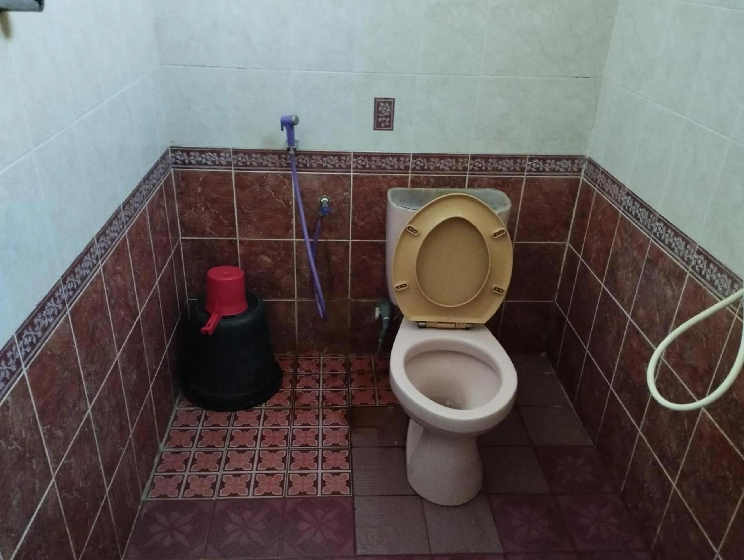 Bathroom in Hotel O Losmen Griya Mulia Katingan Kuala