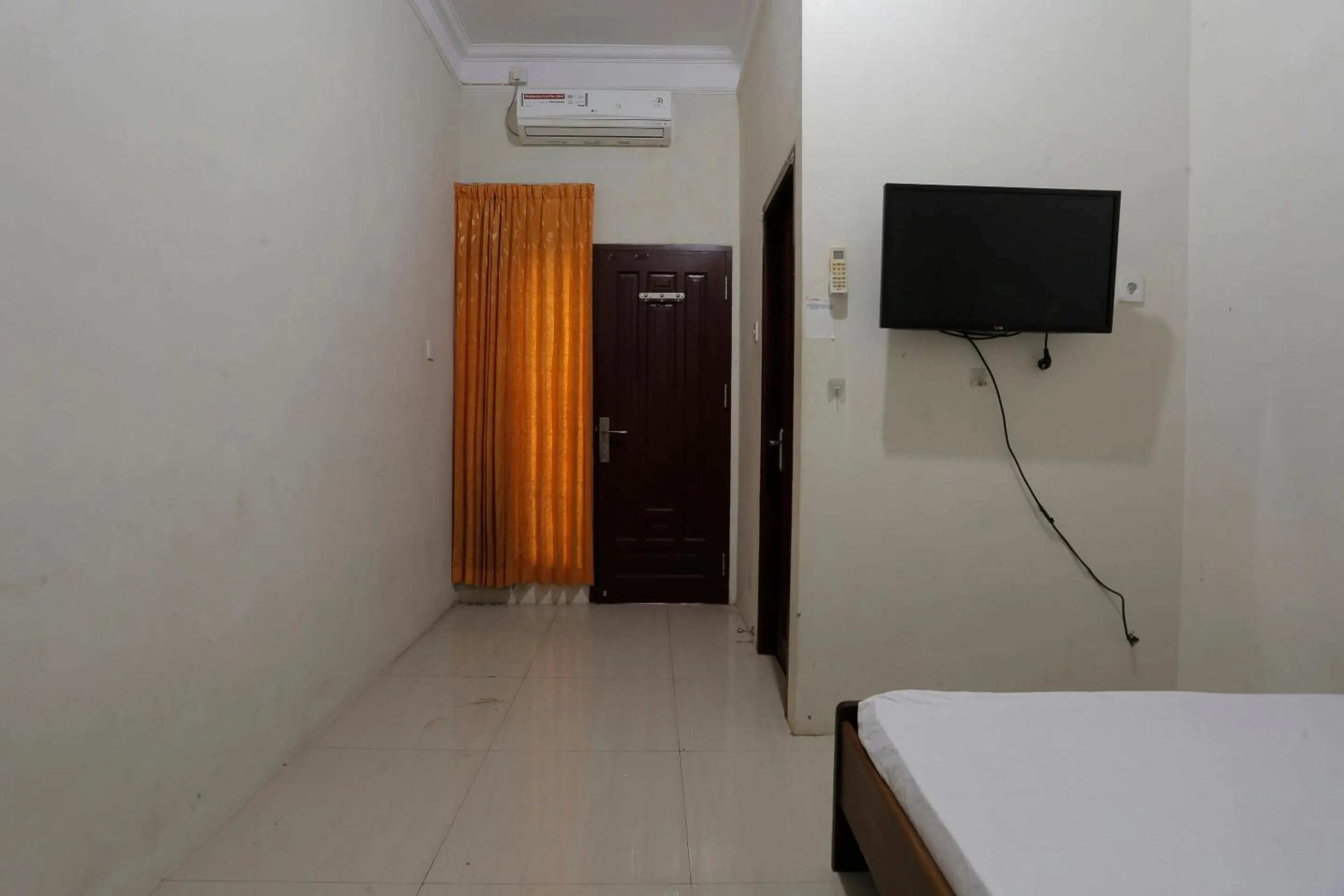 Bedroom in Hotel O Rumah Kost Kita Tarakan