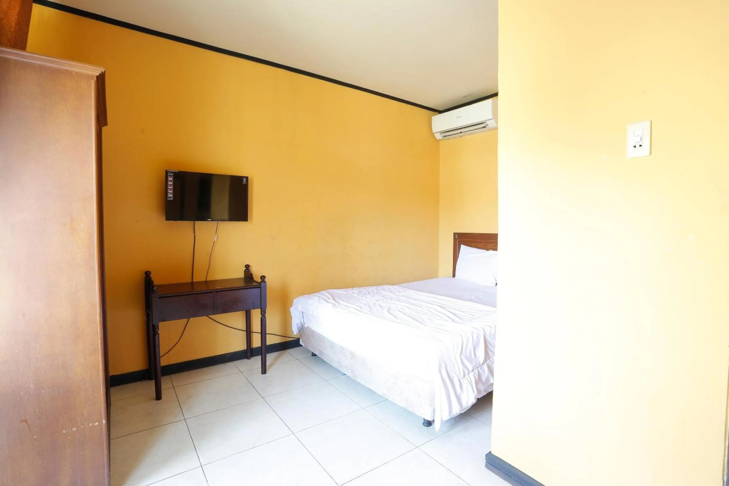 Bedroom in Hotel O Rumah Kost Kita Tarakan