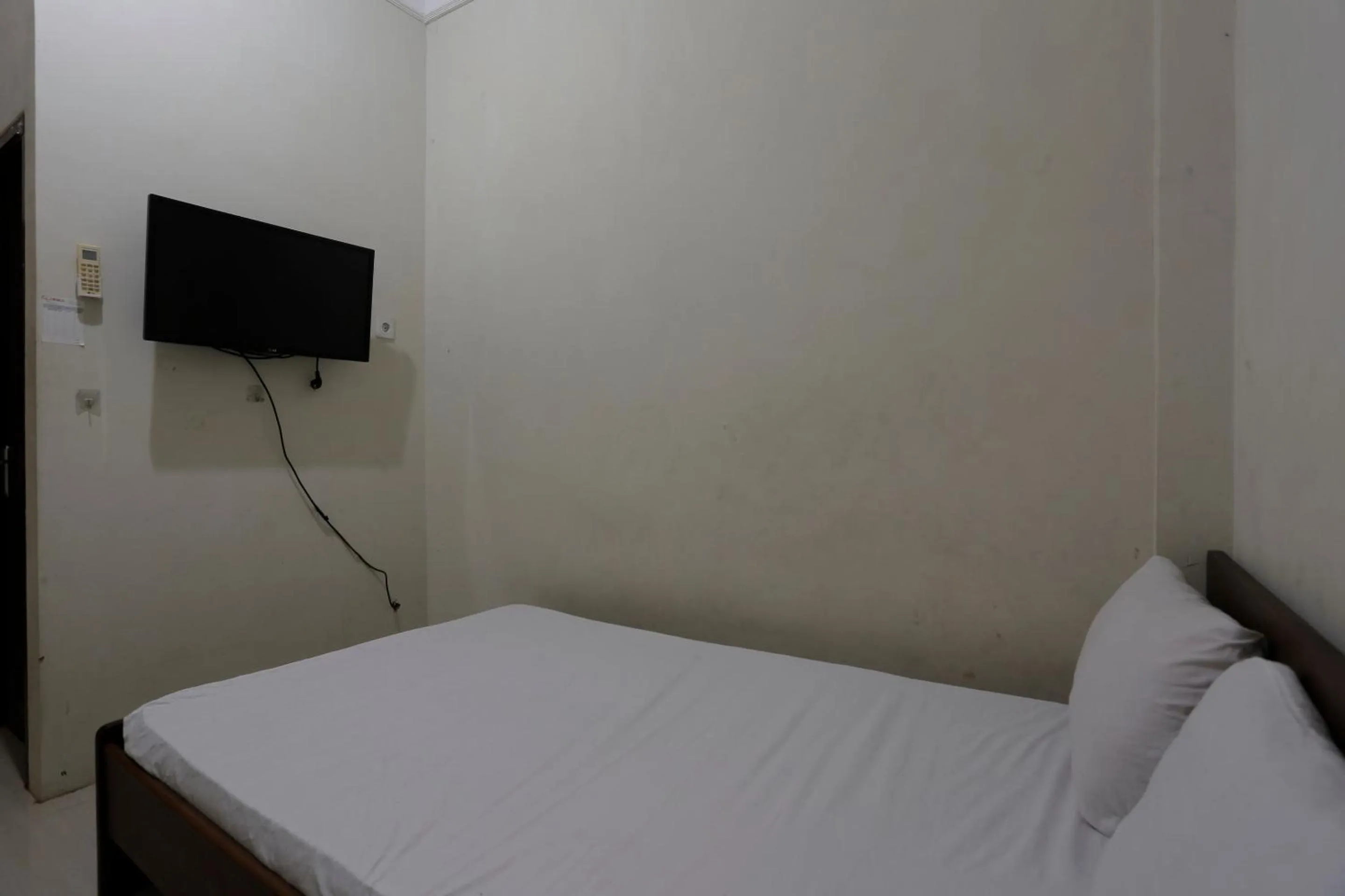 Bedroom in Hotel O Rumah Kost Kita Tarakan