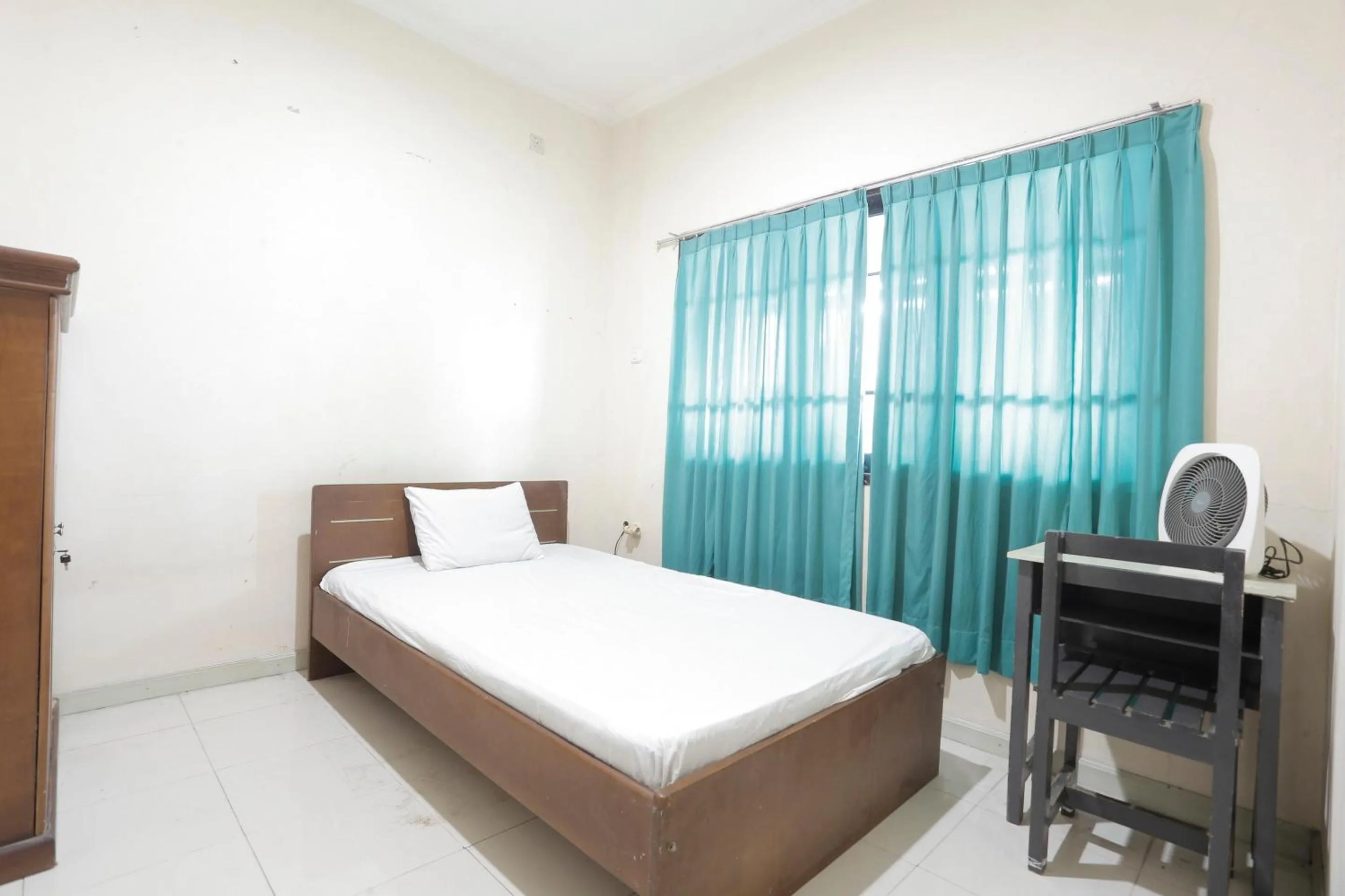 Bedroom in Hotel O Rumah Kost Kita Tarakan