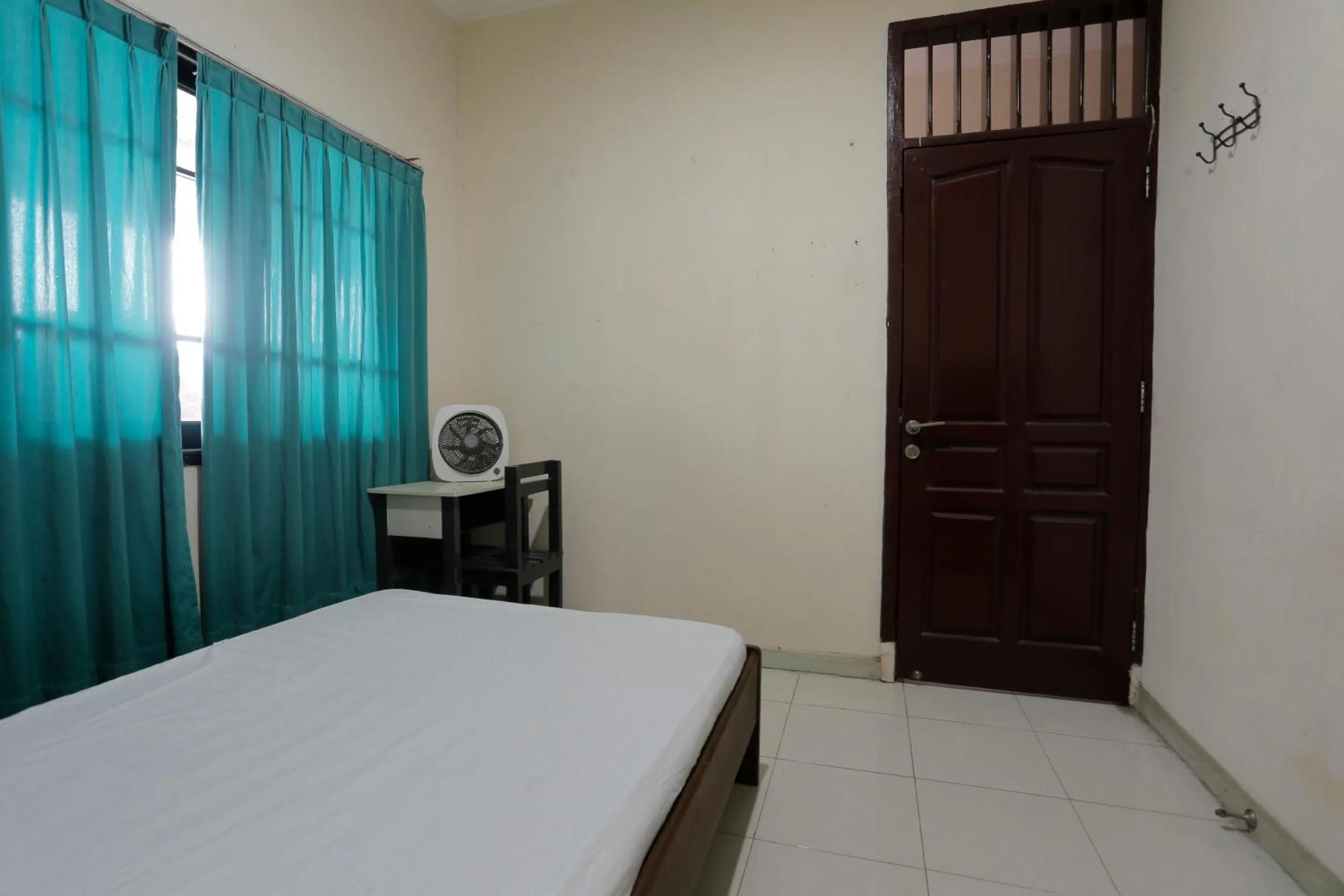 Bedroom in Hotel O Rumah Kost Kita Tarakan