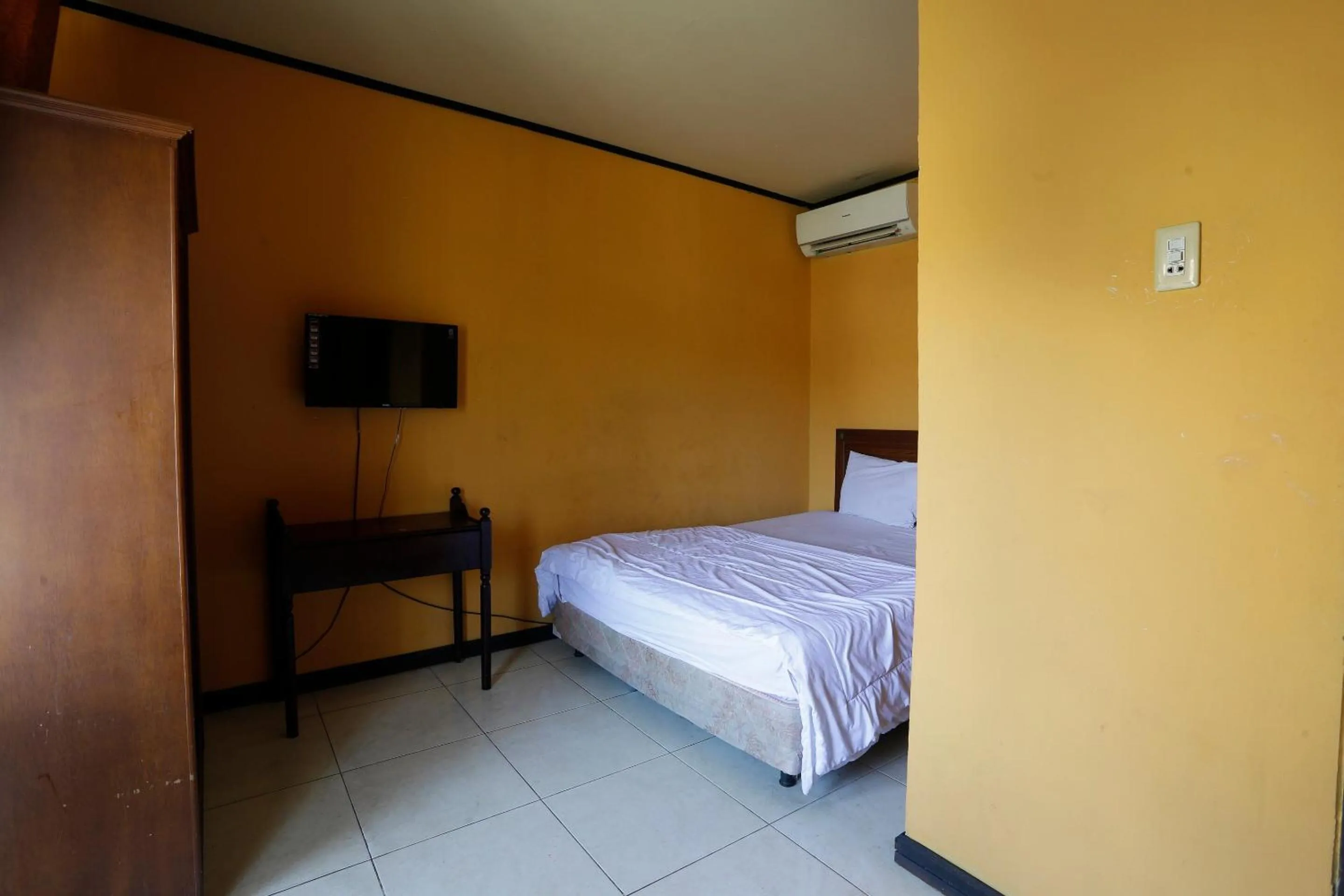 Bedroom in Hotel O Rumah Kost Kita Tarakan