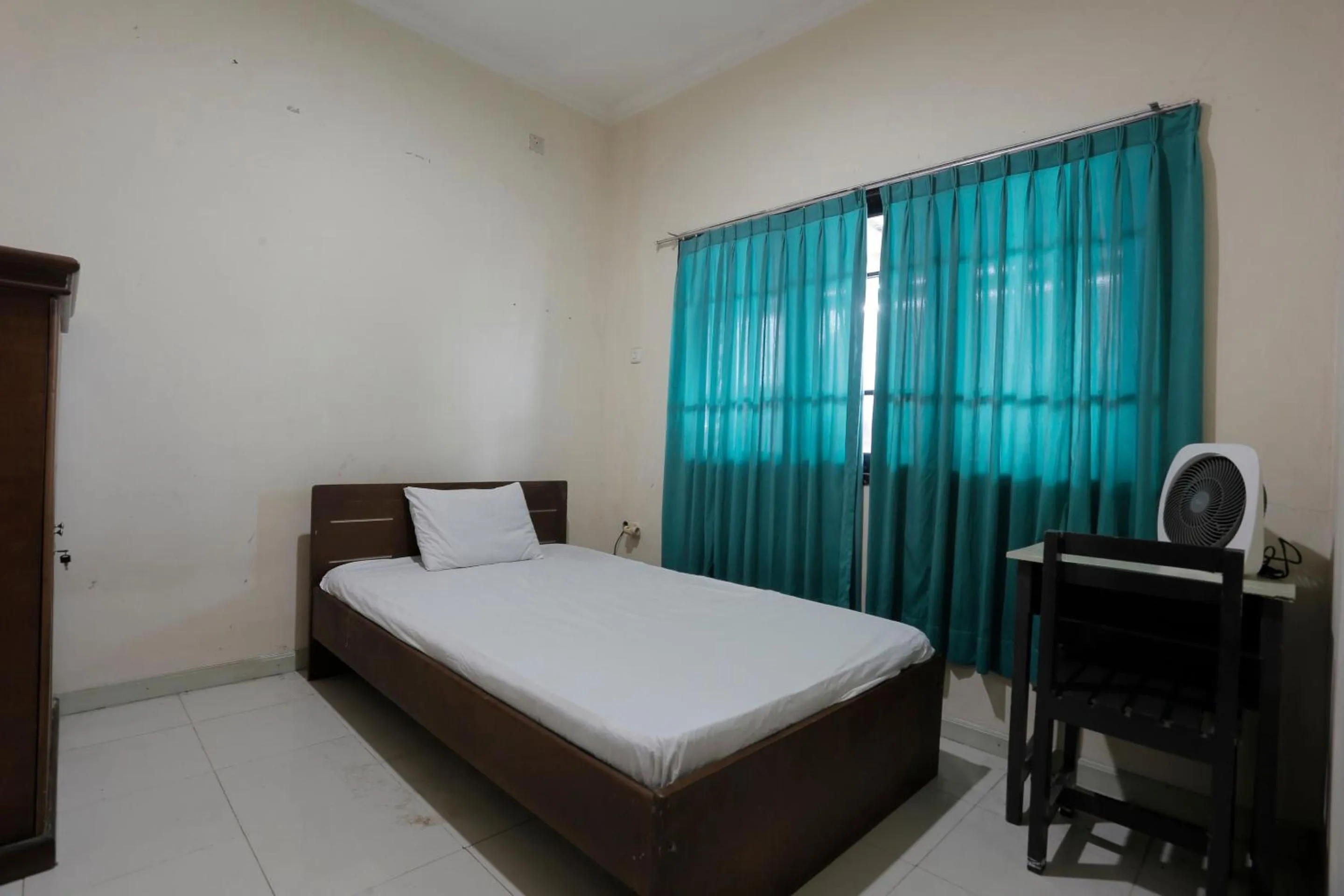 Bedroom in Hotel O Rumah Kost Kita Tarakan