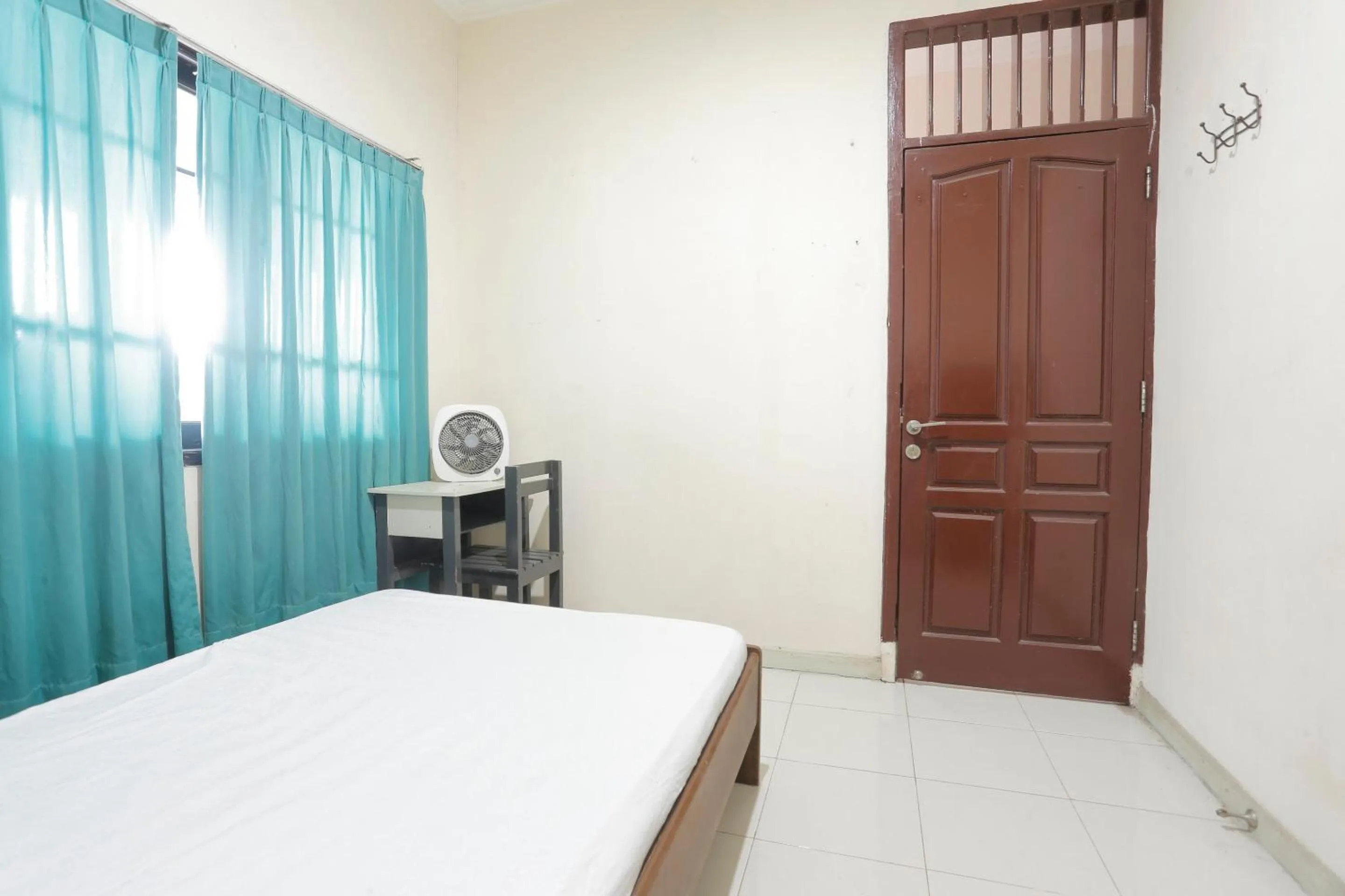 Bedroom in Hotel O Rumah Kost Kita Tarakan