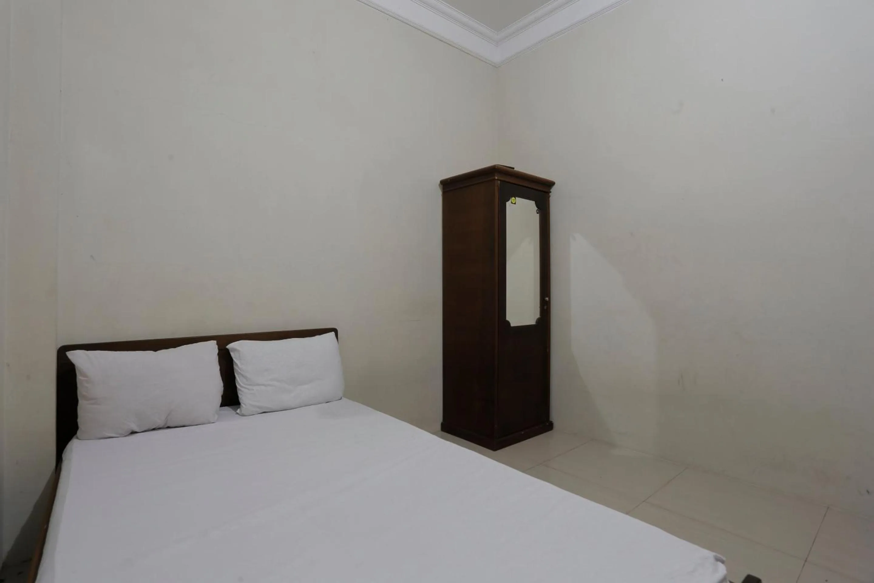 Bedroom in Hotel O Rumah Kost Kita Tarakan