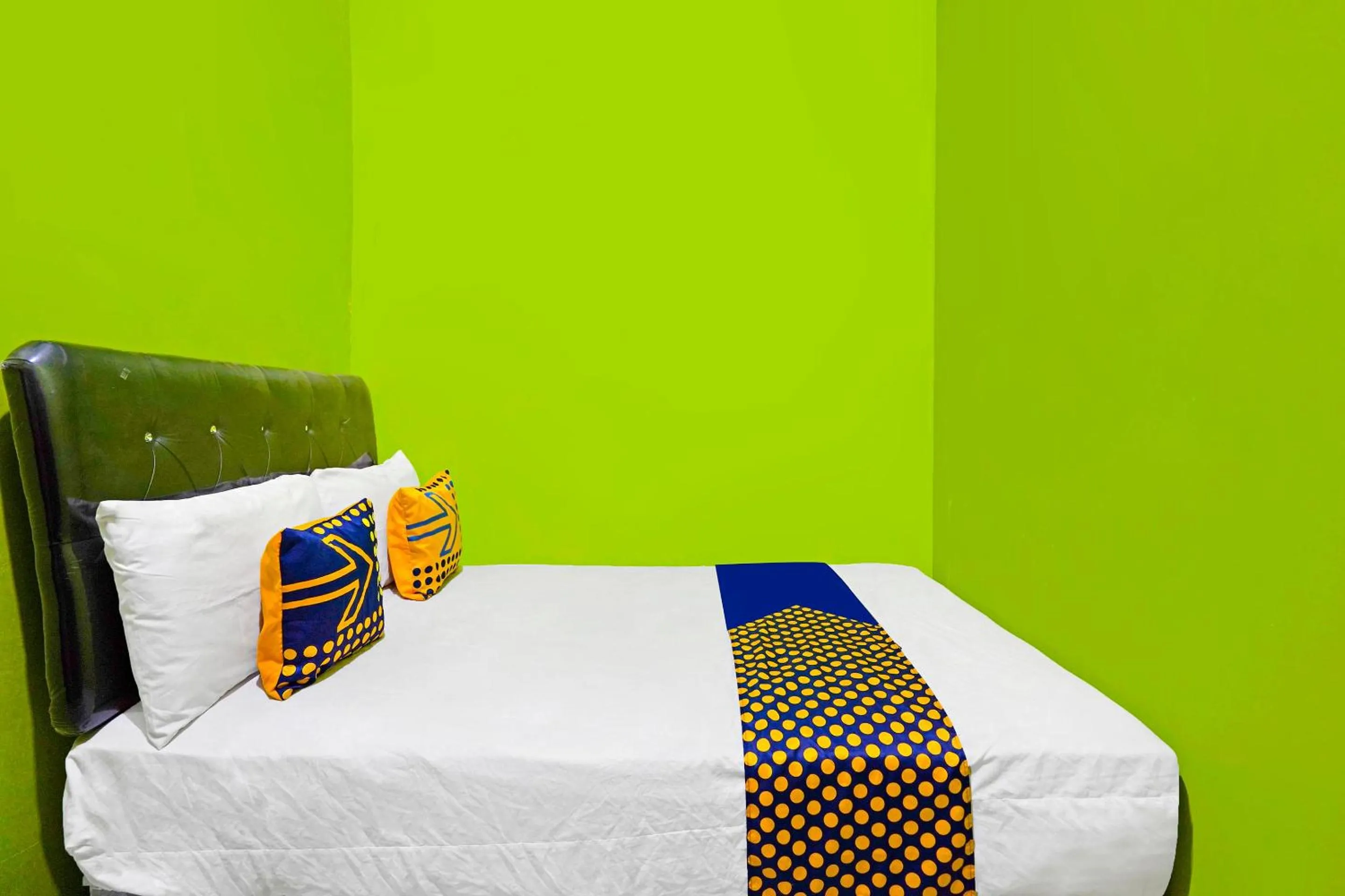 Bedroom, Bed in Hotel O Homestay Barokah