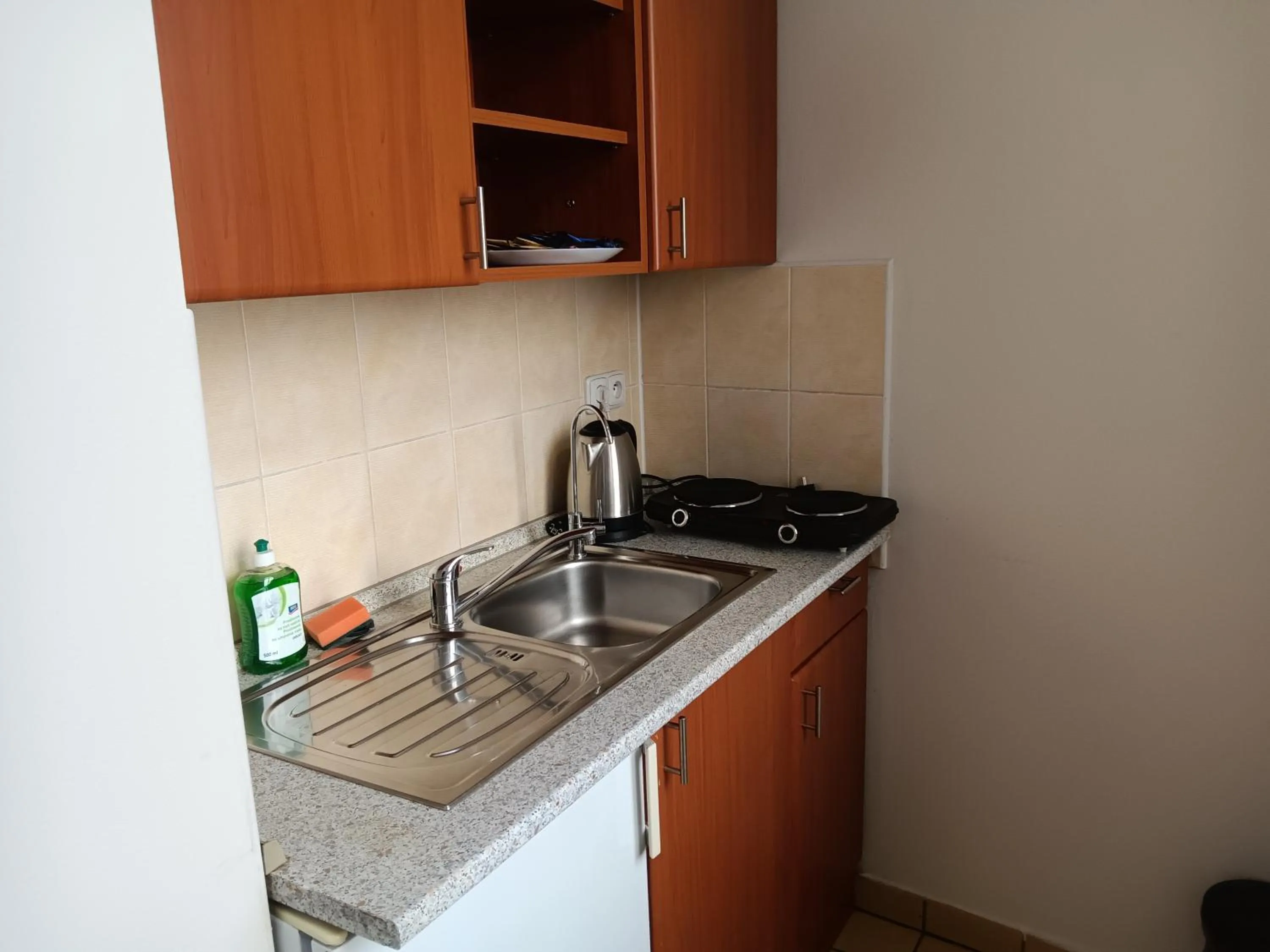 Kitchen or kitchenette in Powder Tower Suites