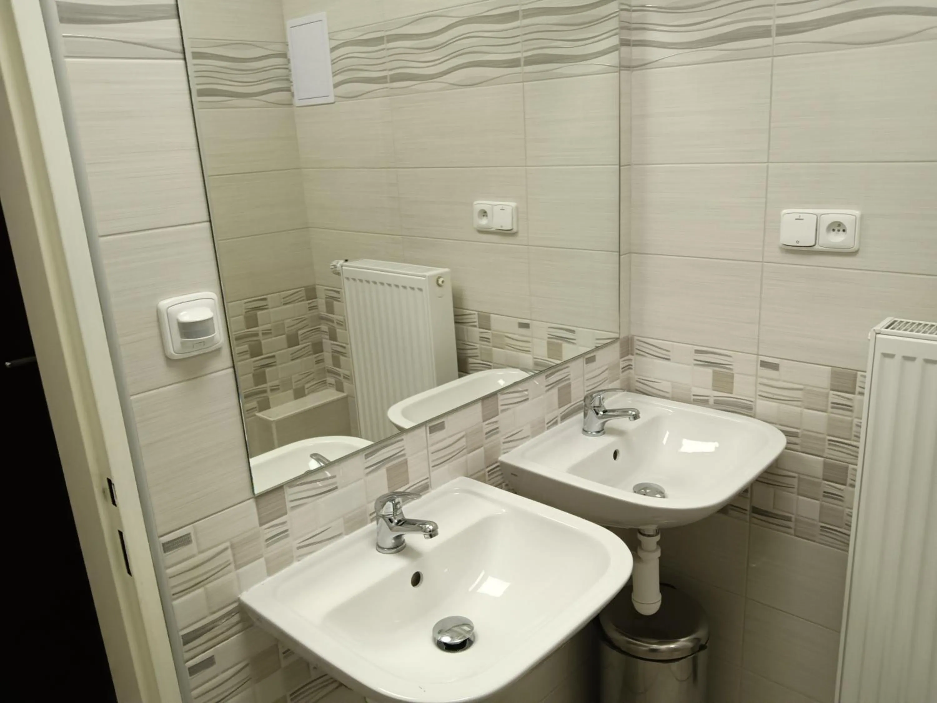 Toilet in Powder Tower Suites