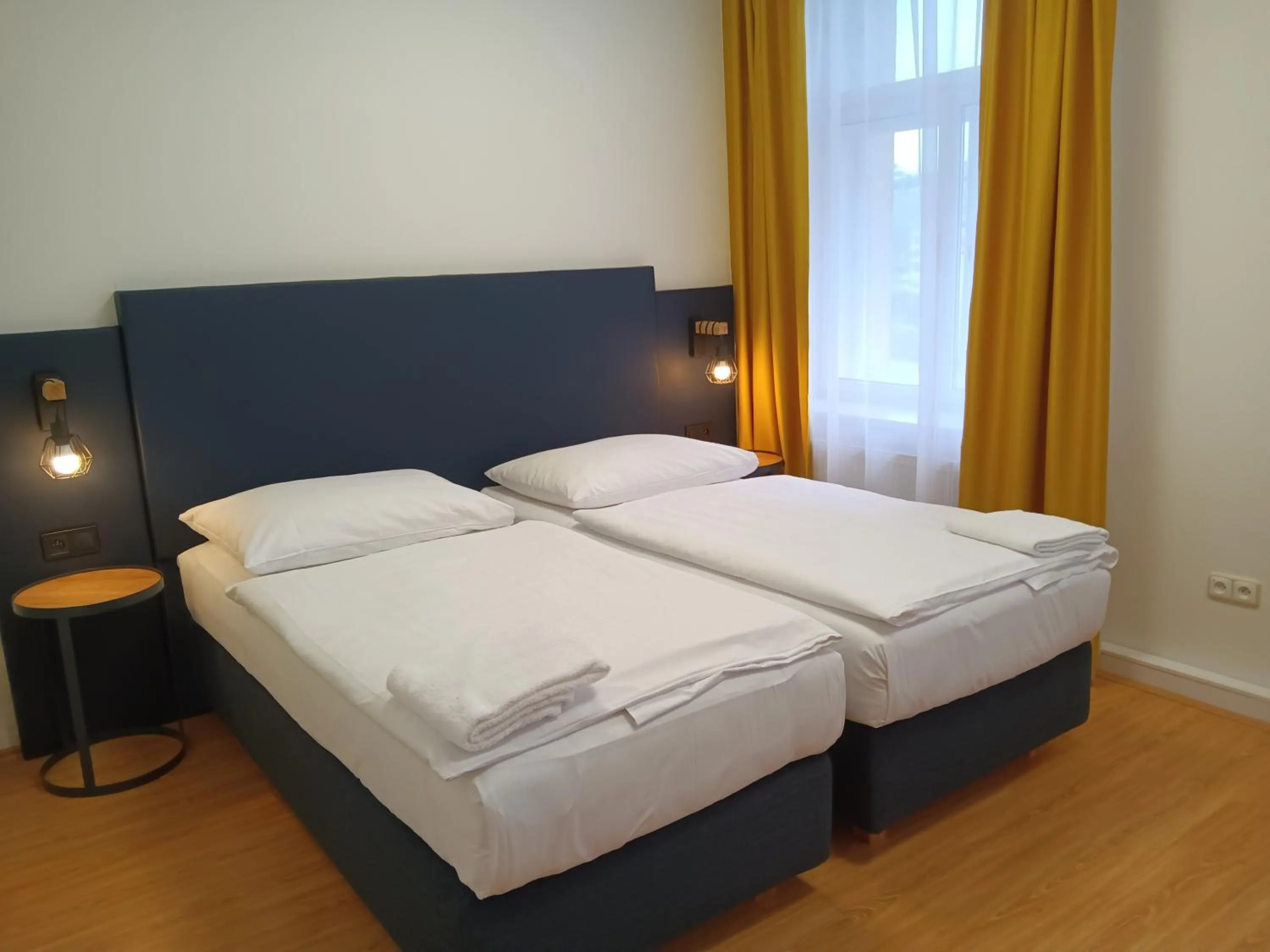 Bed in Powder Tower Suites