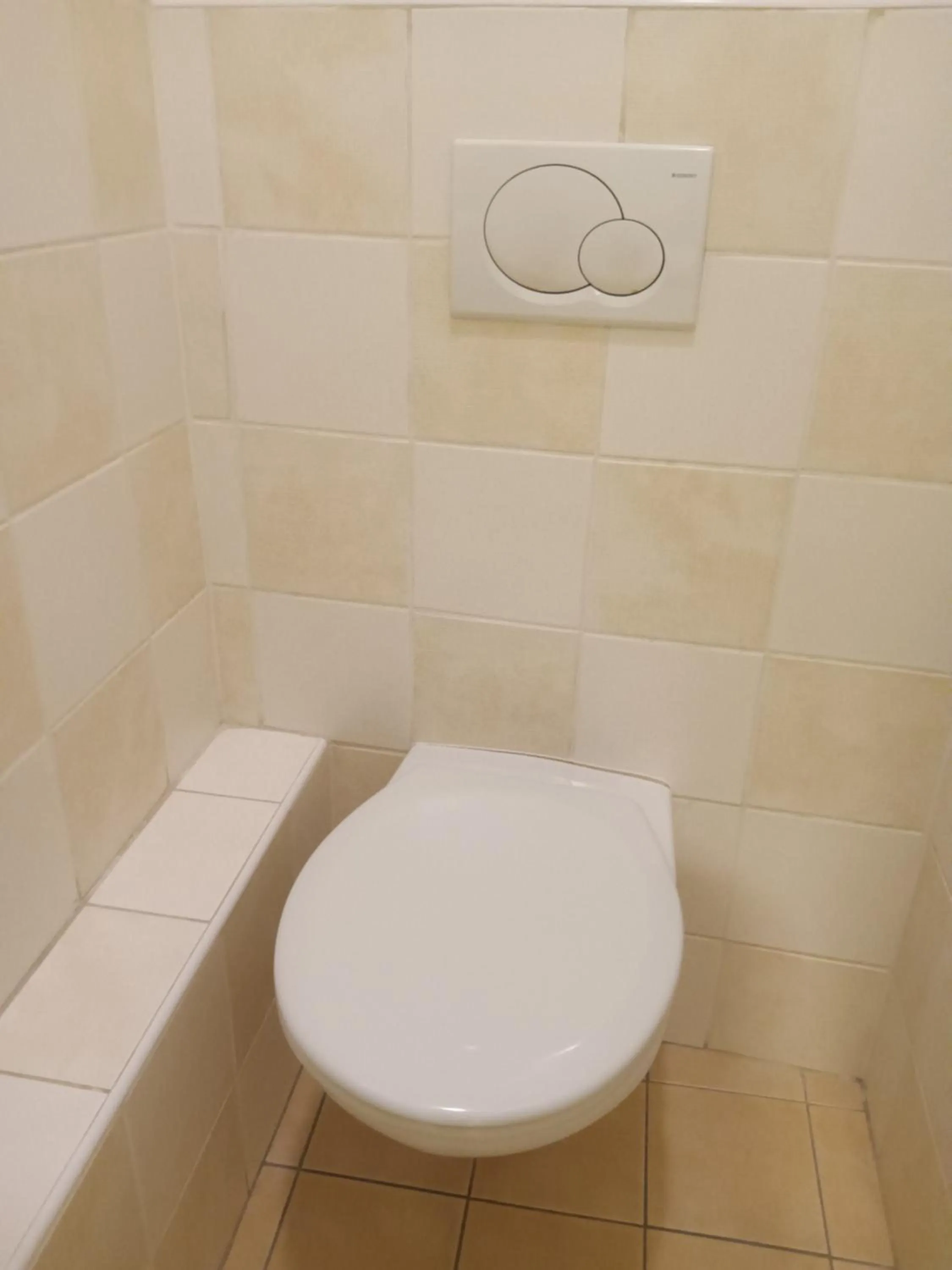 Toilet in Powder Tower Suites