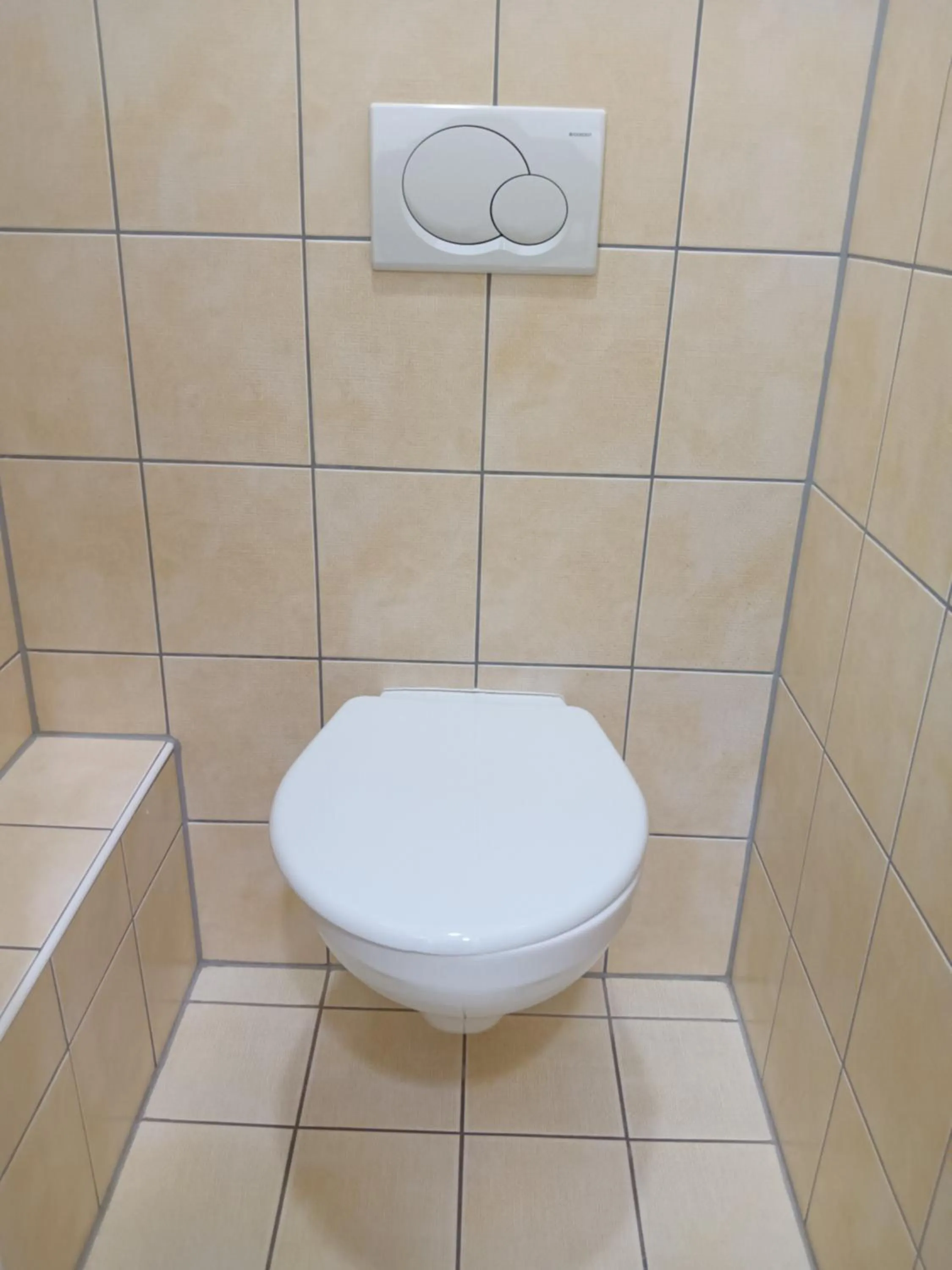 Toilet in Powder Tower Suites