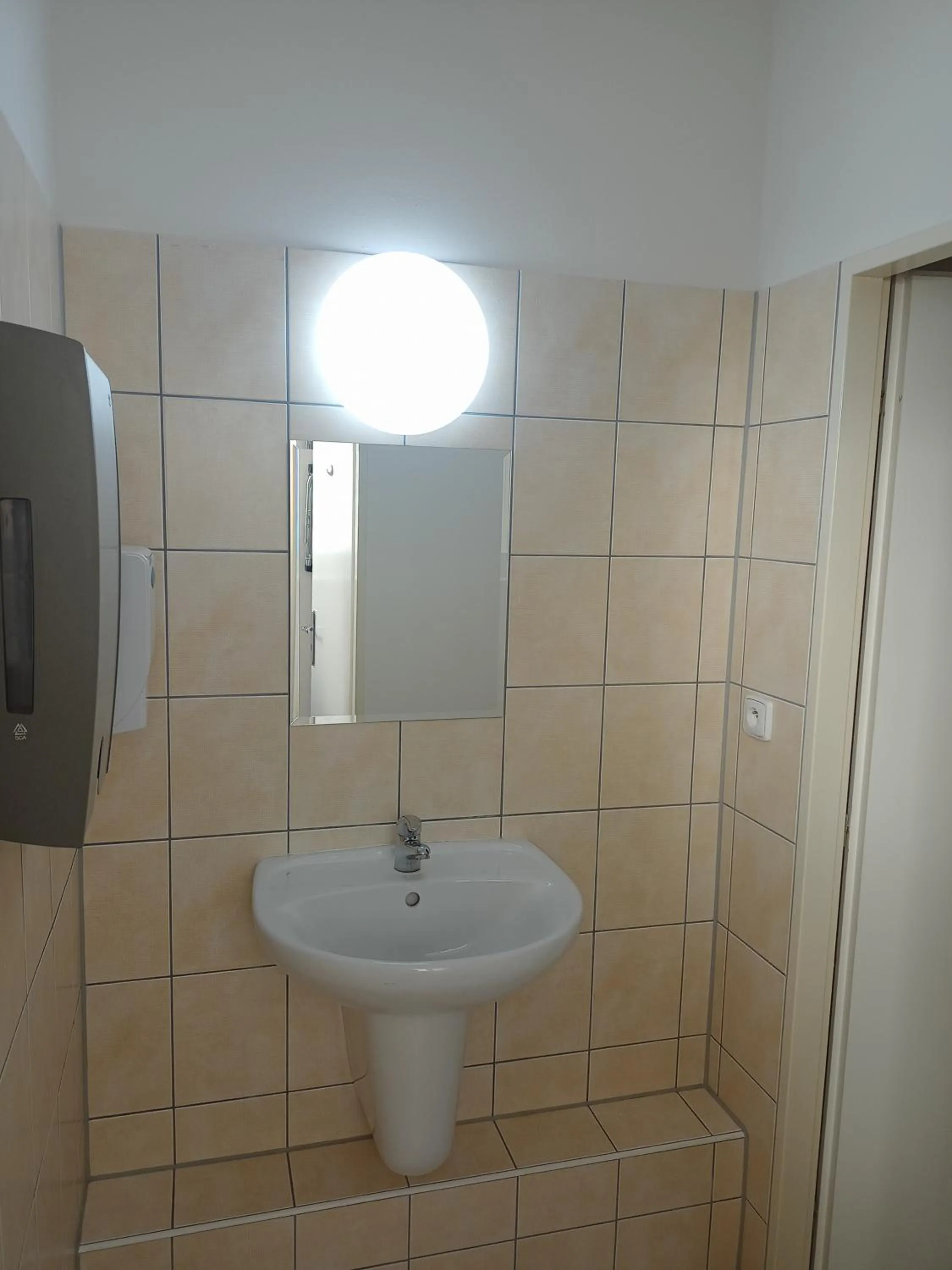 Toilet in Powder Tower Suites