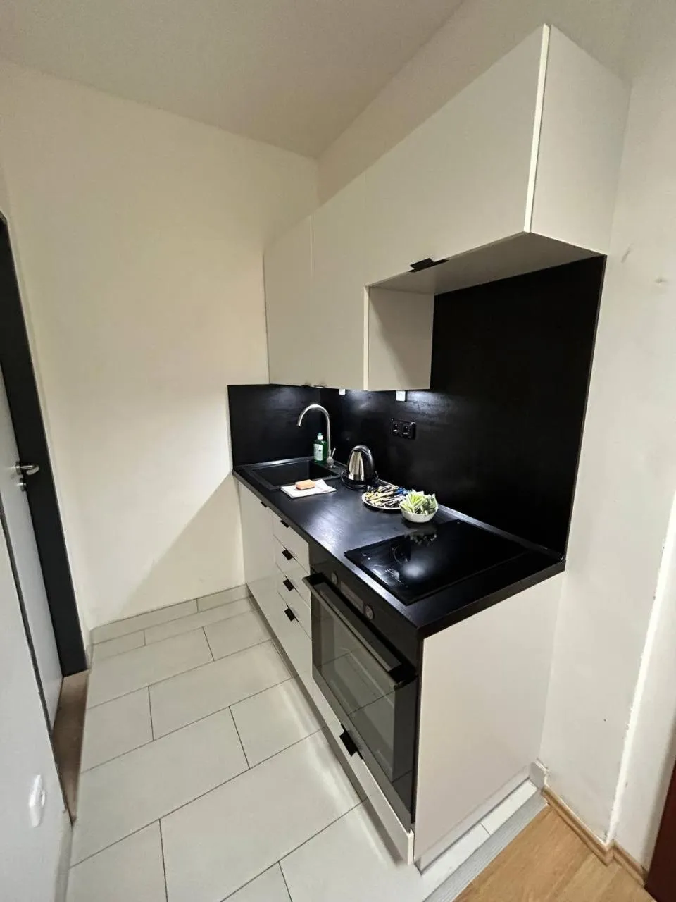 Kitchen or kitchenette in Powder Tower Suites