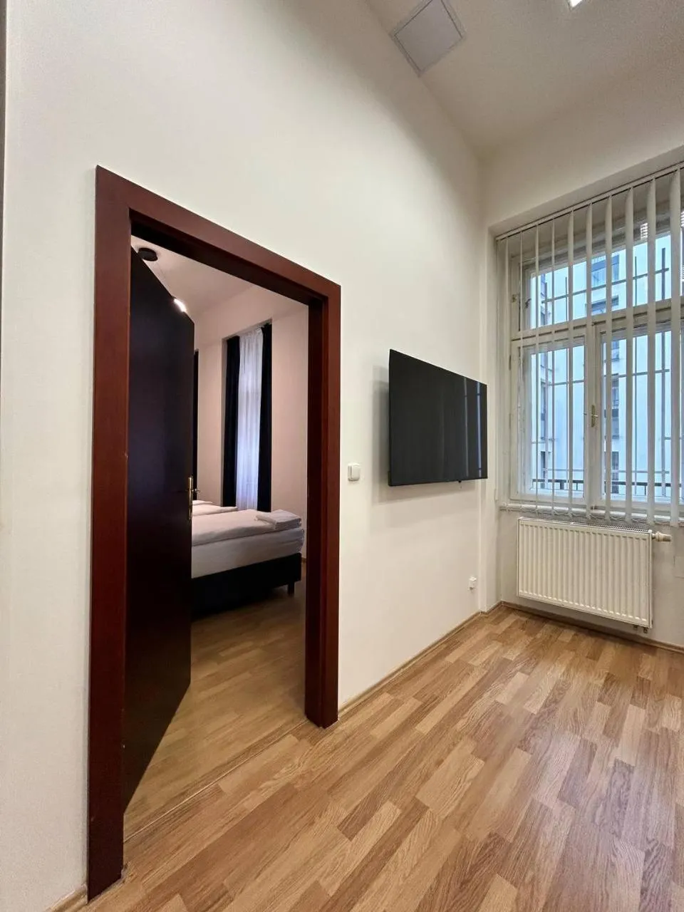 Communal lounge/ TV room, Bed in Powder Tower Suites