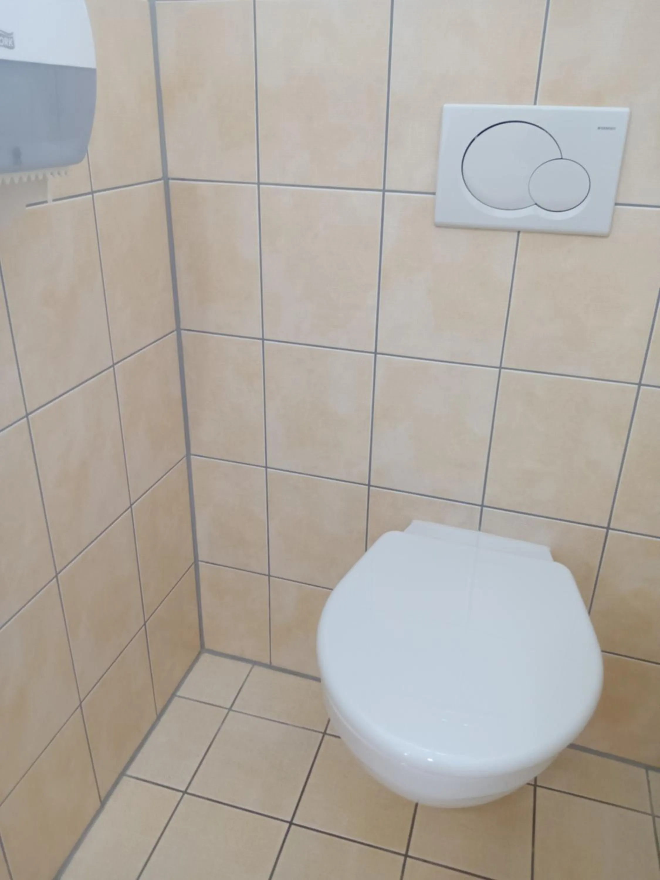 Toilet in Powder Tower Suites