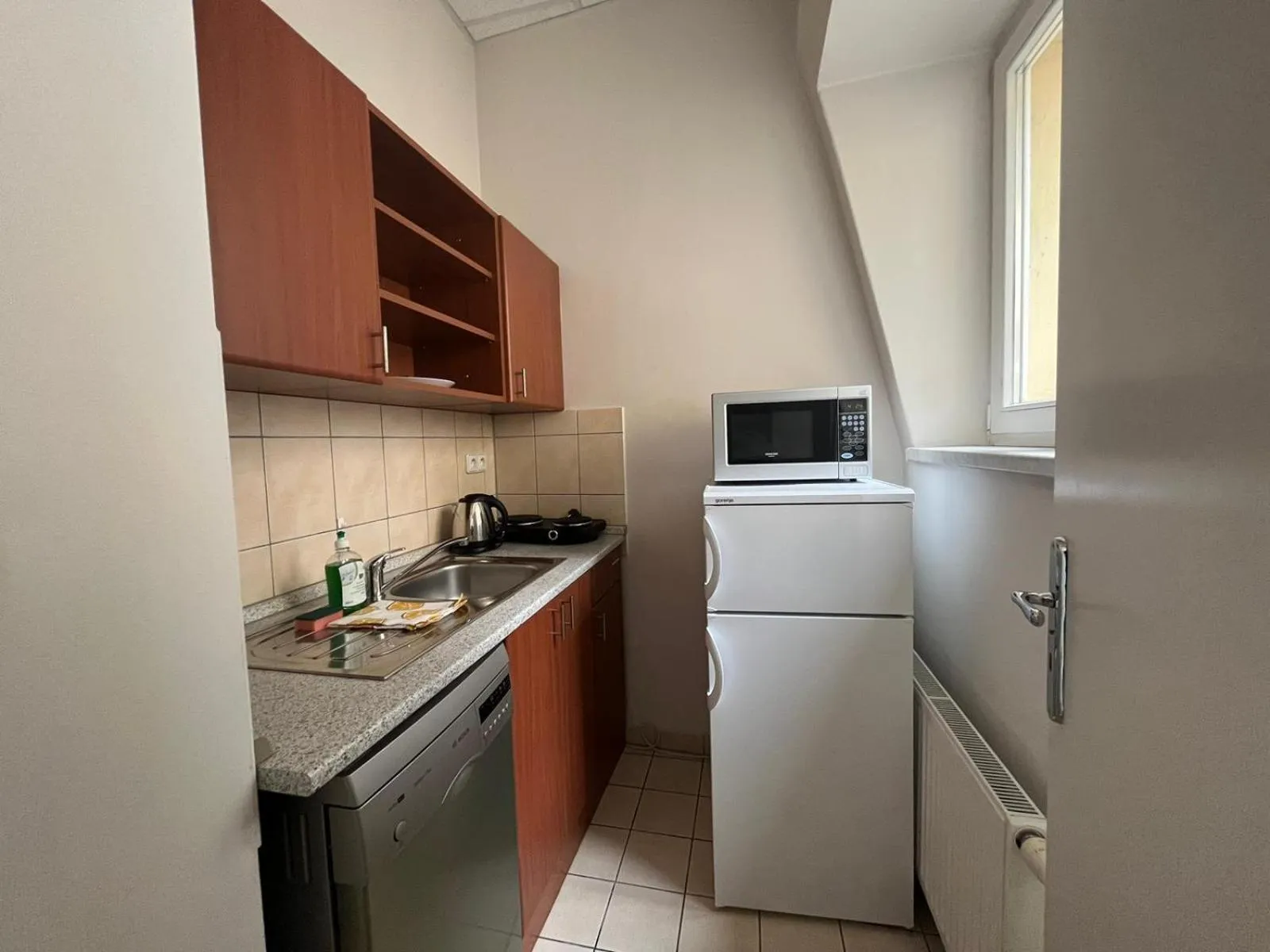 Kitchen or kitchenette in Powder Tower Suites