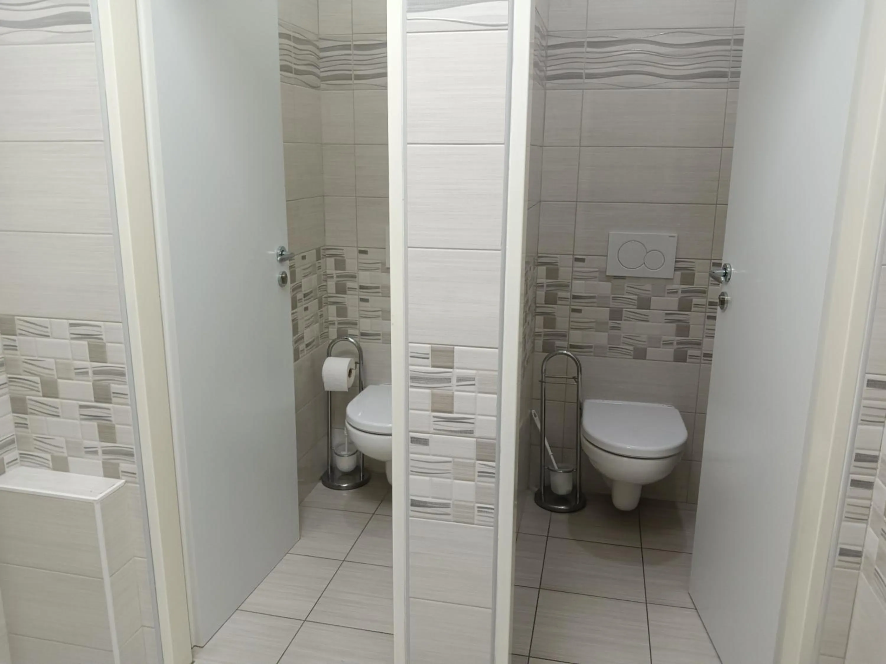 Toilet in Powder Tower Suites